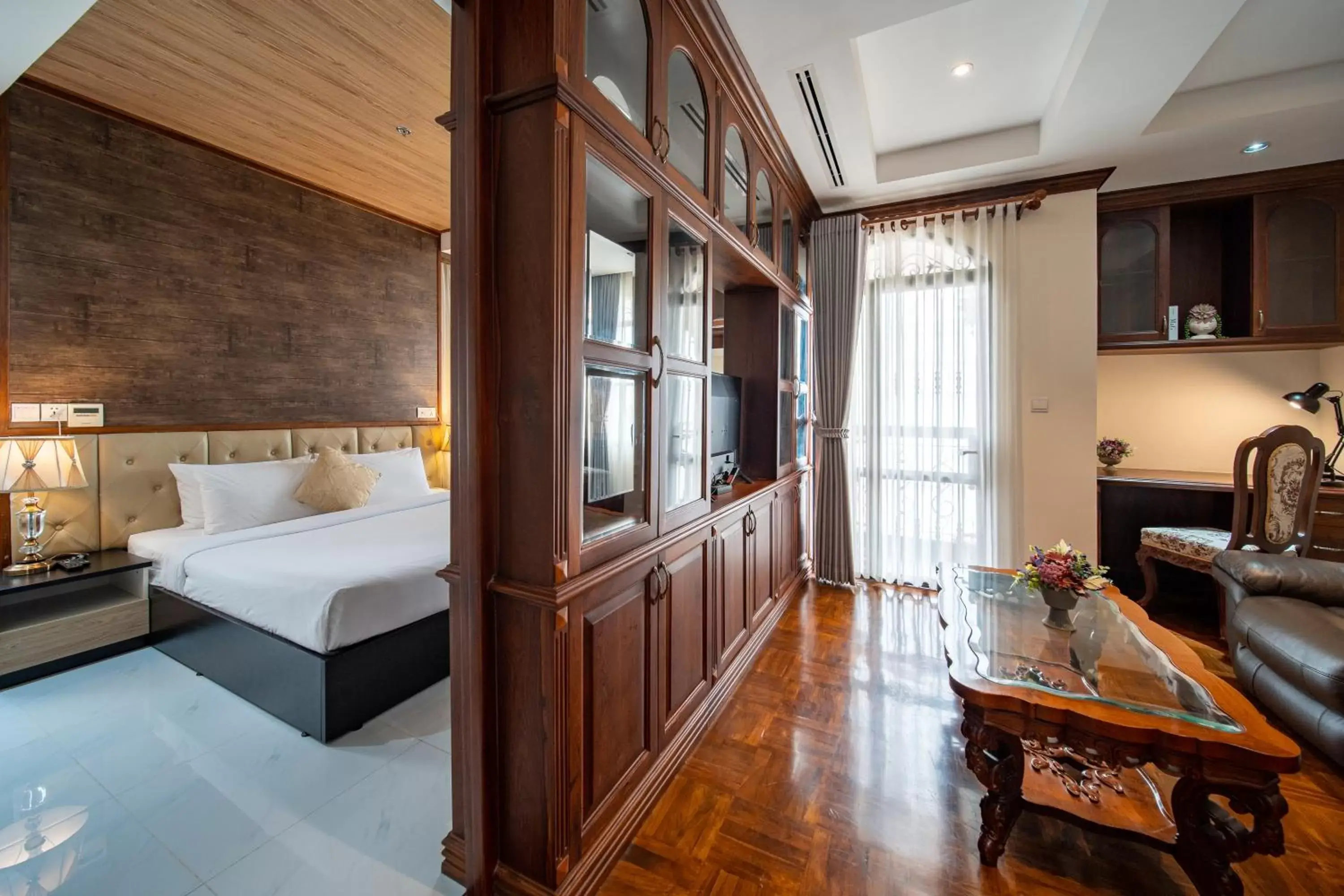 Seating area, Bed in LCS Hotel & Apartment Seating area, Bed in LCS Hotel & Apartment