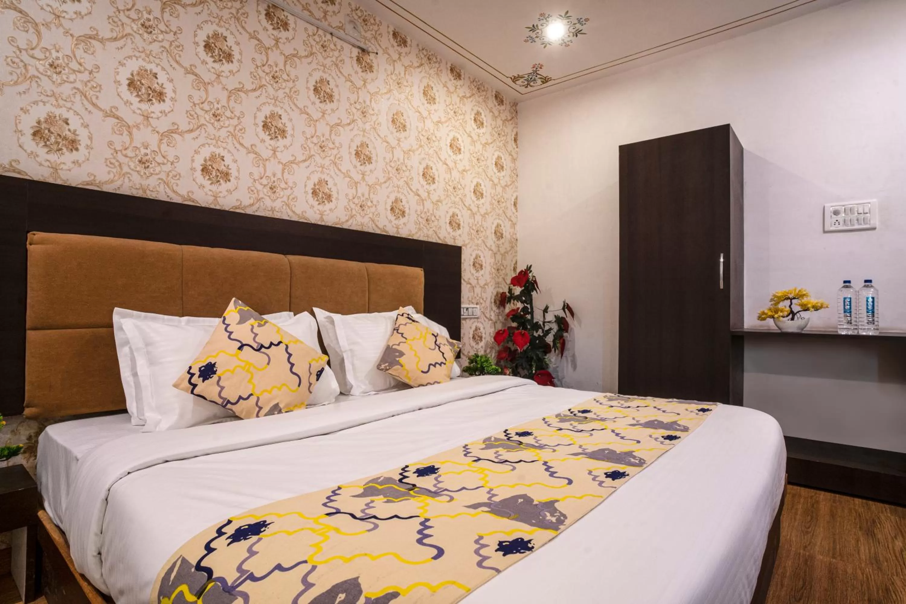 Bed in Tripli Hotels Arunoday Palace