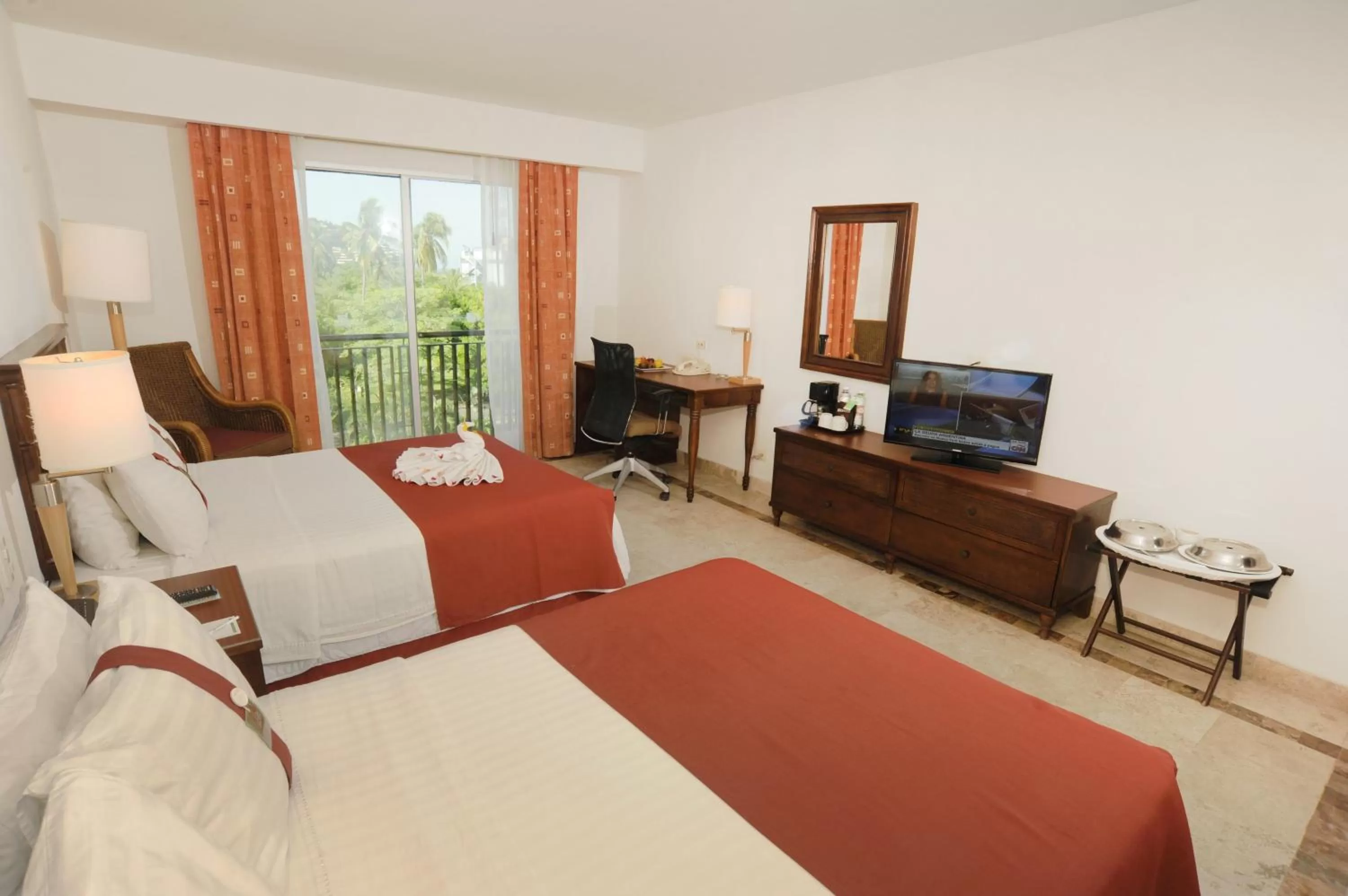 Photo of the whole room, Bed in Gamma Plaza Ixtapa