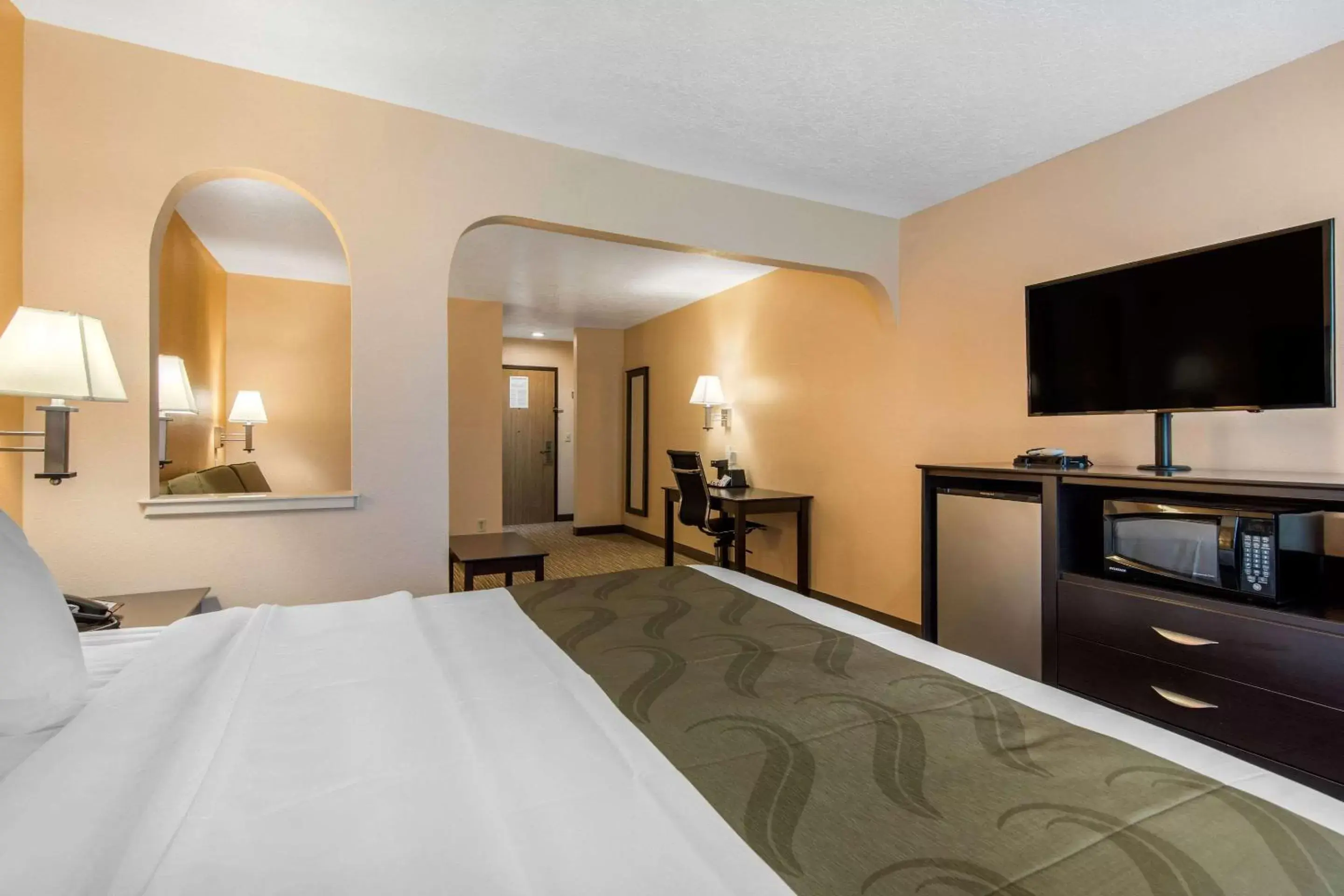 Photo of the whole room, TV/Entertainment Center in Quality Inn & Suites Albuquerque North near Balloon Fiesta Park