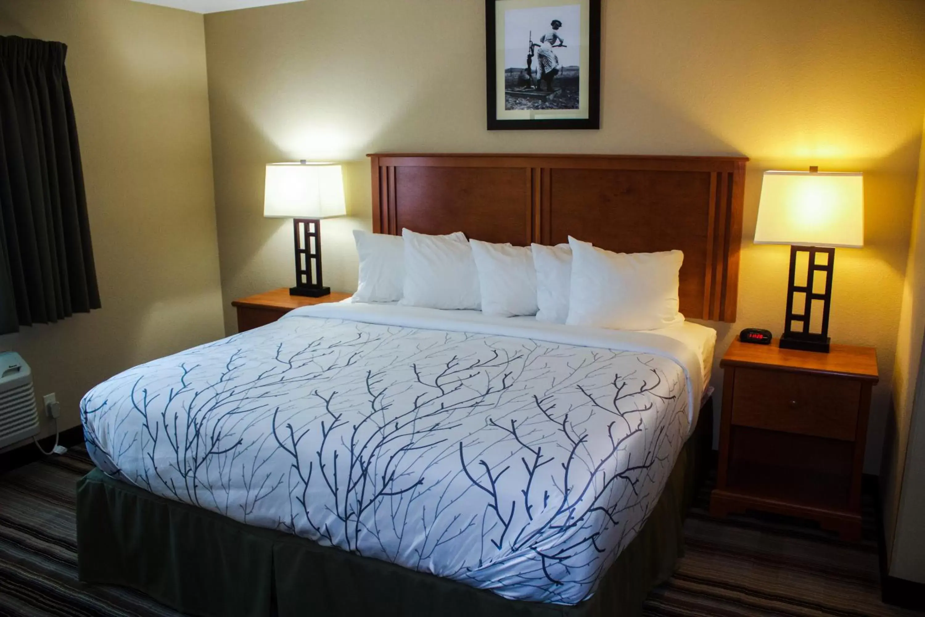 Bed in Bowman Lodge & Convention Center