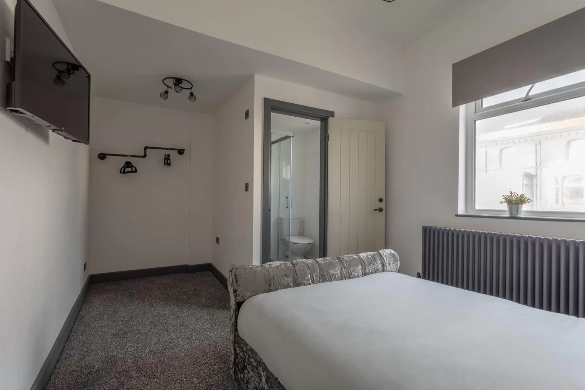 Bed in RESIDENCY LUXURY SEAFRONT HOTEL