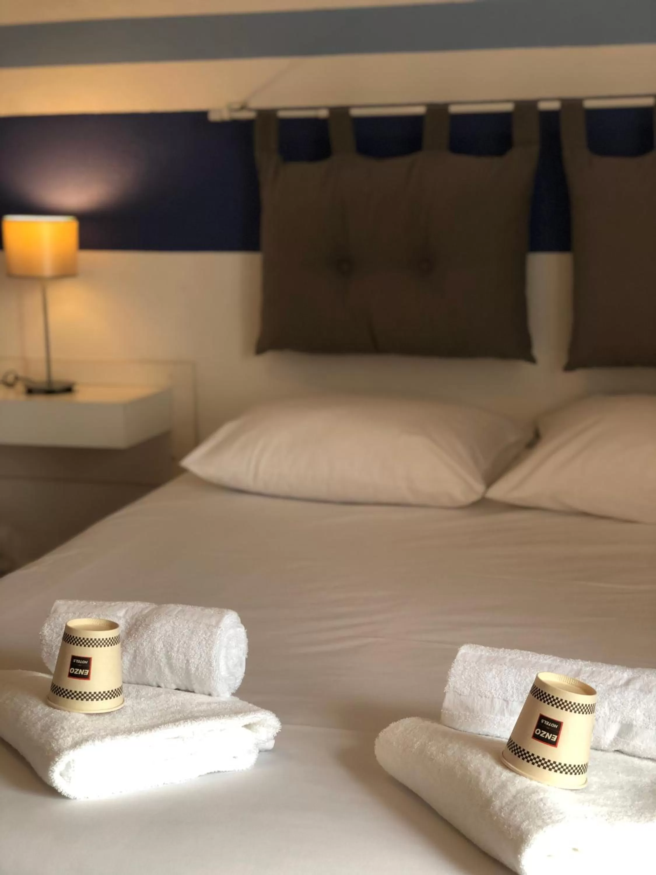 Bed in Enzo Hotels Neufchâteau by Kyriad Direct