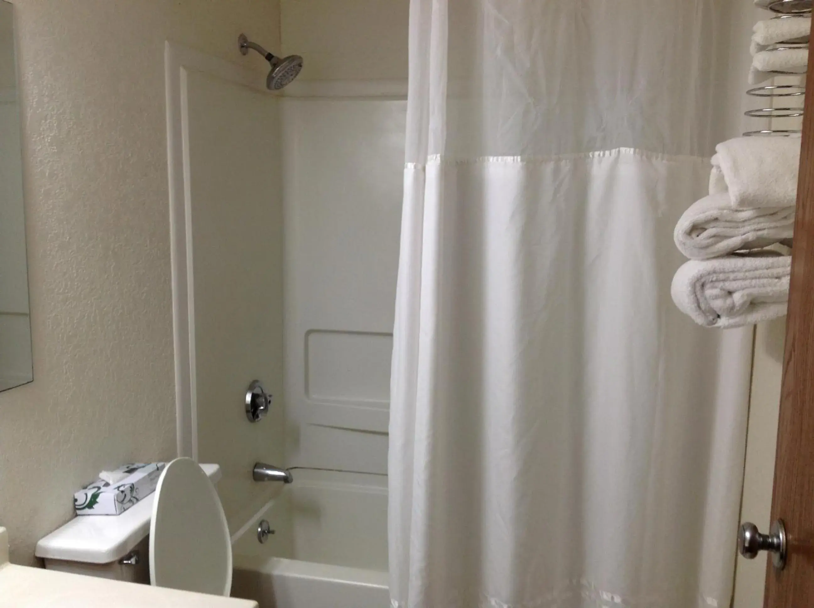 Bathroom in Super 8 by Wyndham Greensboro/Coliseum/Conv.