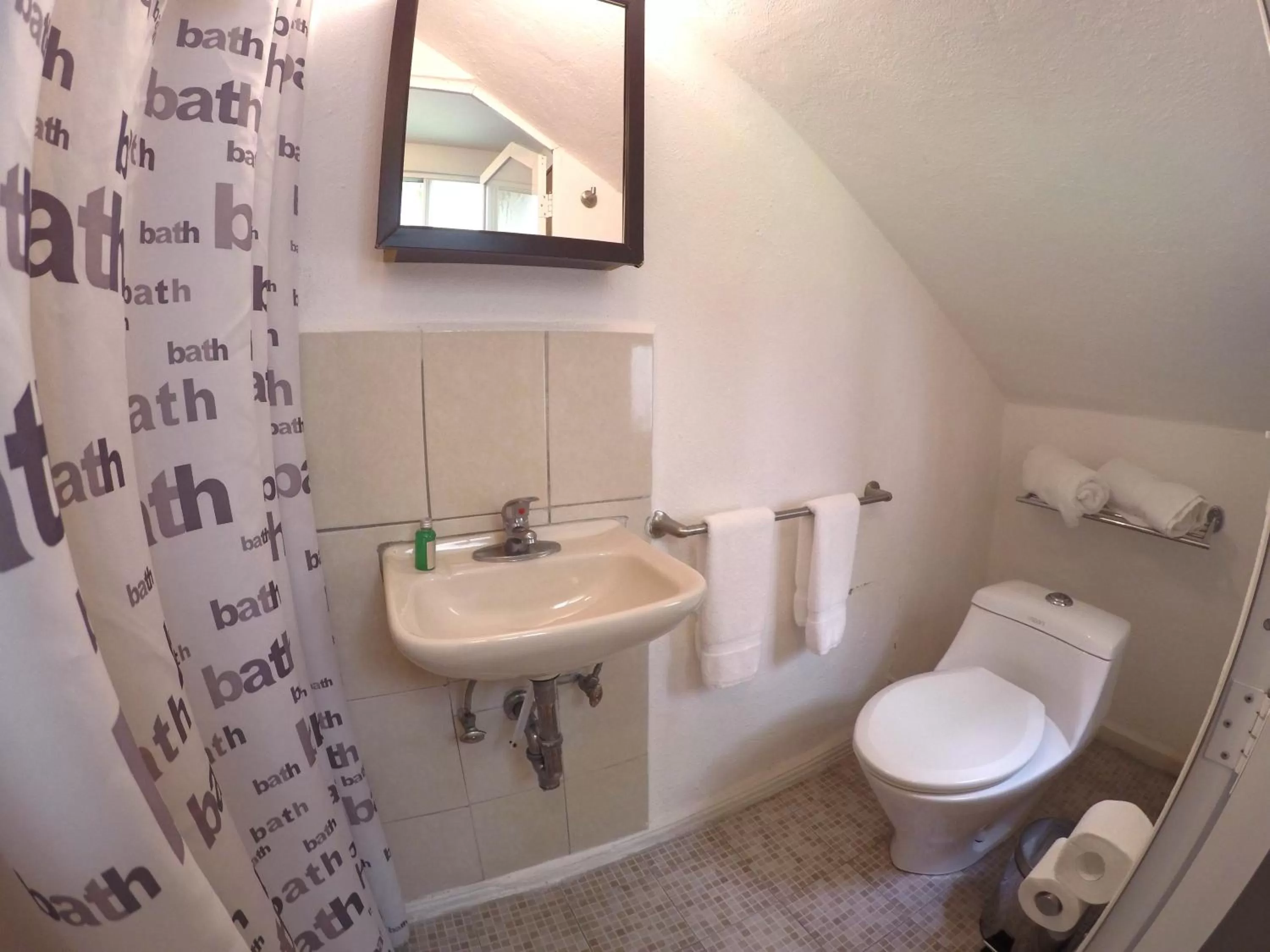 Bathroom in Distrito Condesa Rooms and Studios