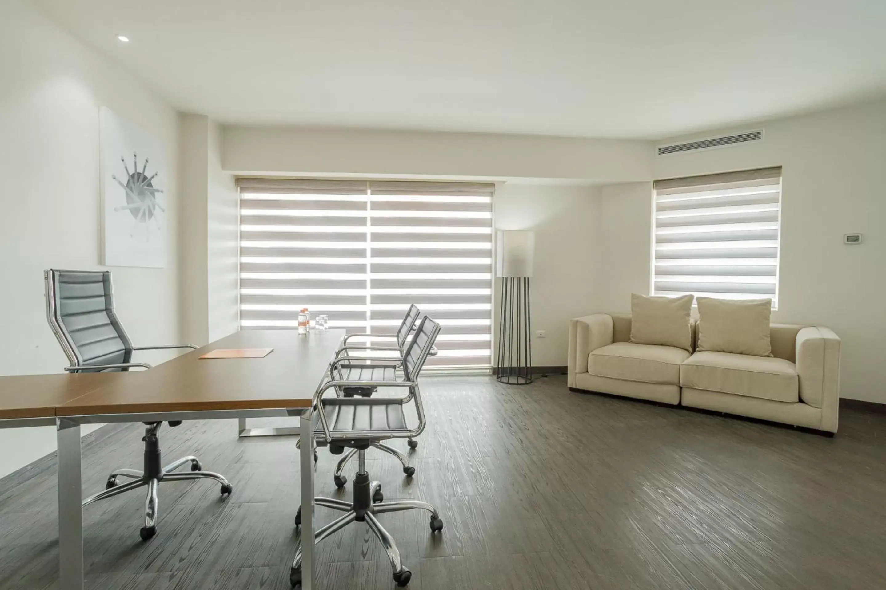 Photo of the whole room, Seating Area in Real Inn Tijuana by Camino Real Hotels