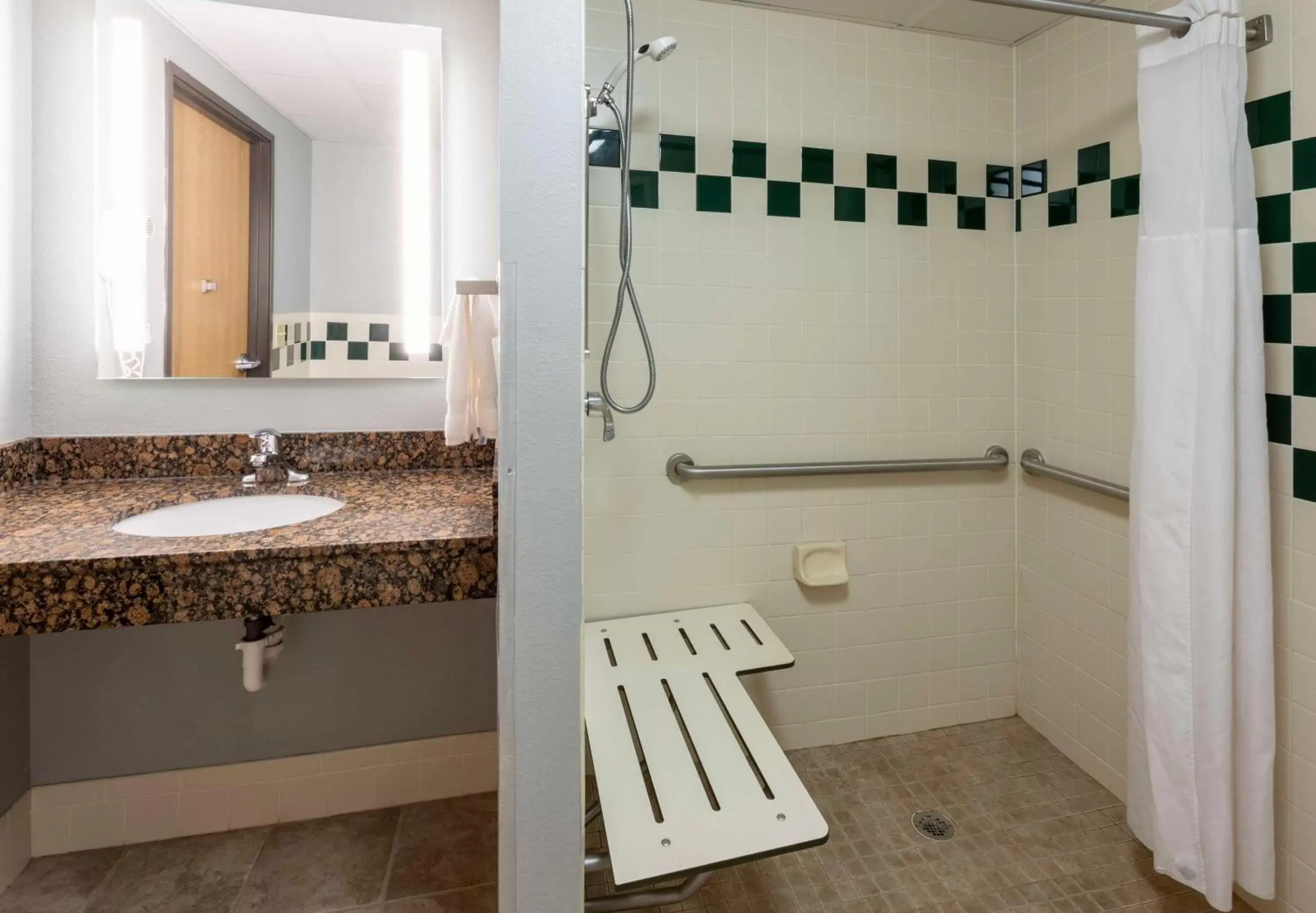 Bathroom in Black Beach Inn by GrandStay