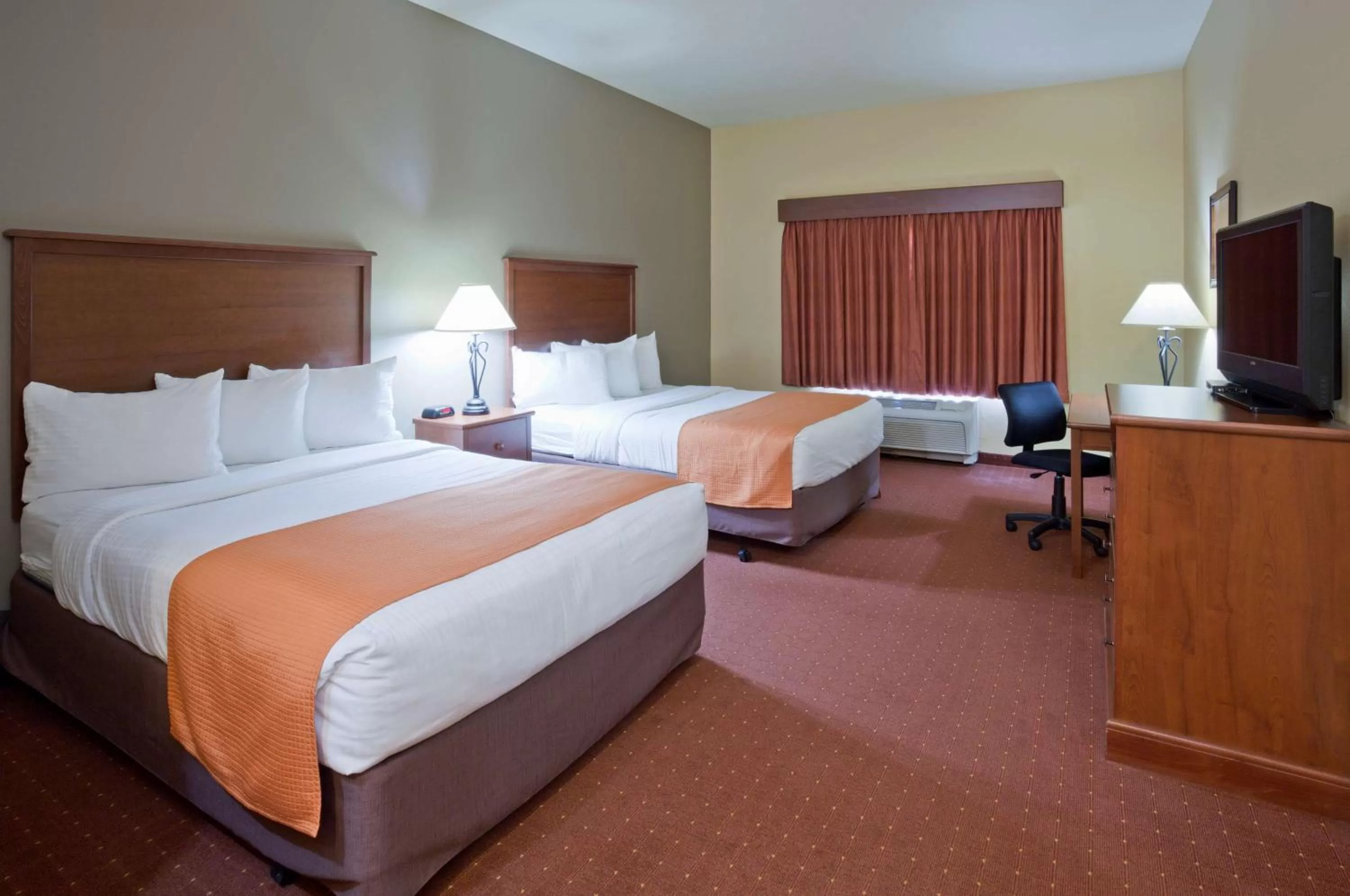 Photo of the whole room, Bed in AmericInn by Wyndham Fargo Medical Center