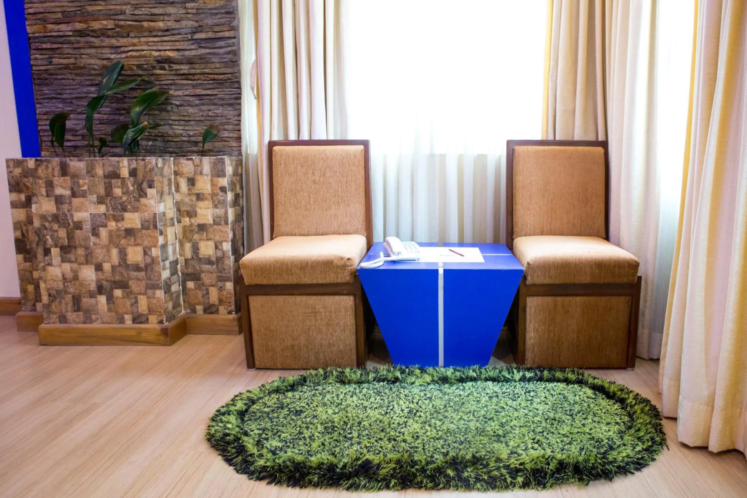 Seating area in Royal Penguin Boutique Hotel & Spa