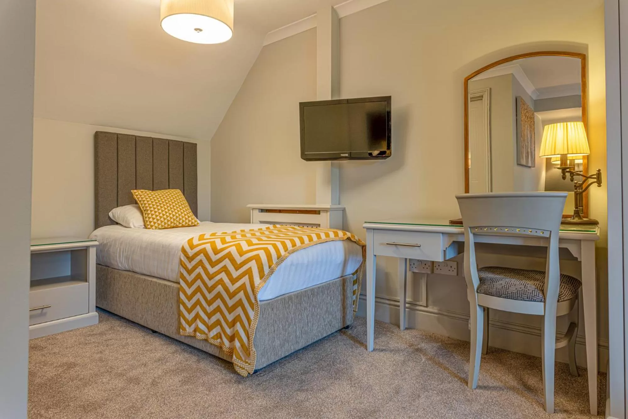 Bed in The Dog & Bear Hotel