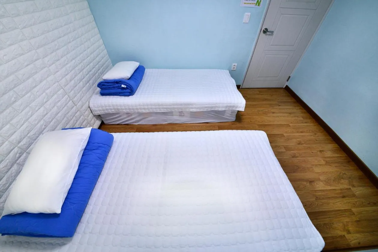 Bed in Gyeongju Namu Guesthouse