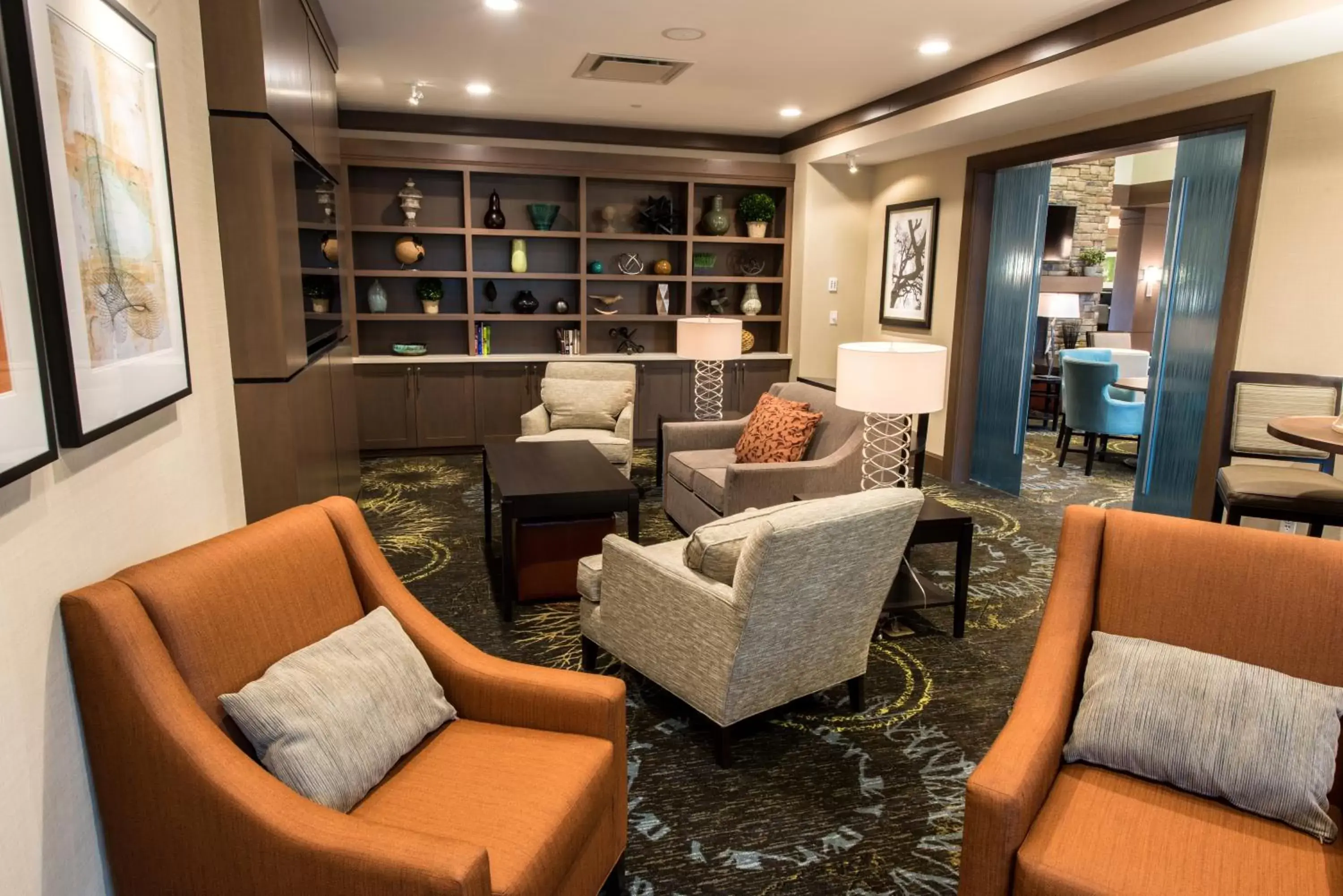 Property building, Seating Area in Staybridge Suites Albany Wolf Rd-Colonie Center, an IHG Hotel