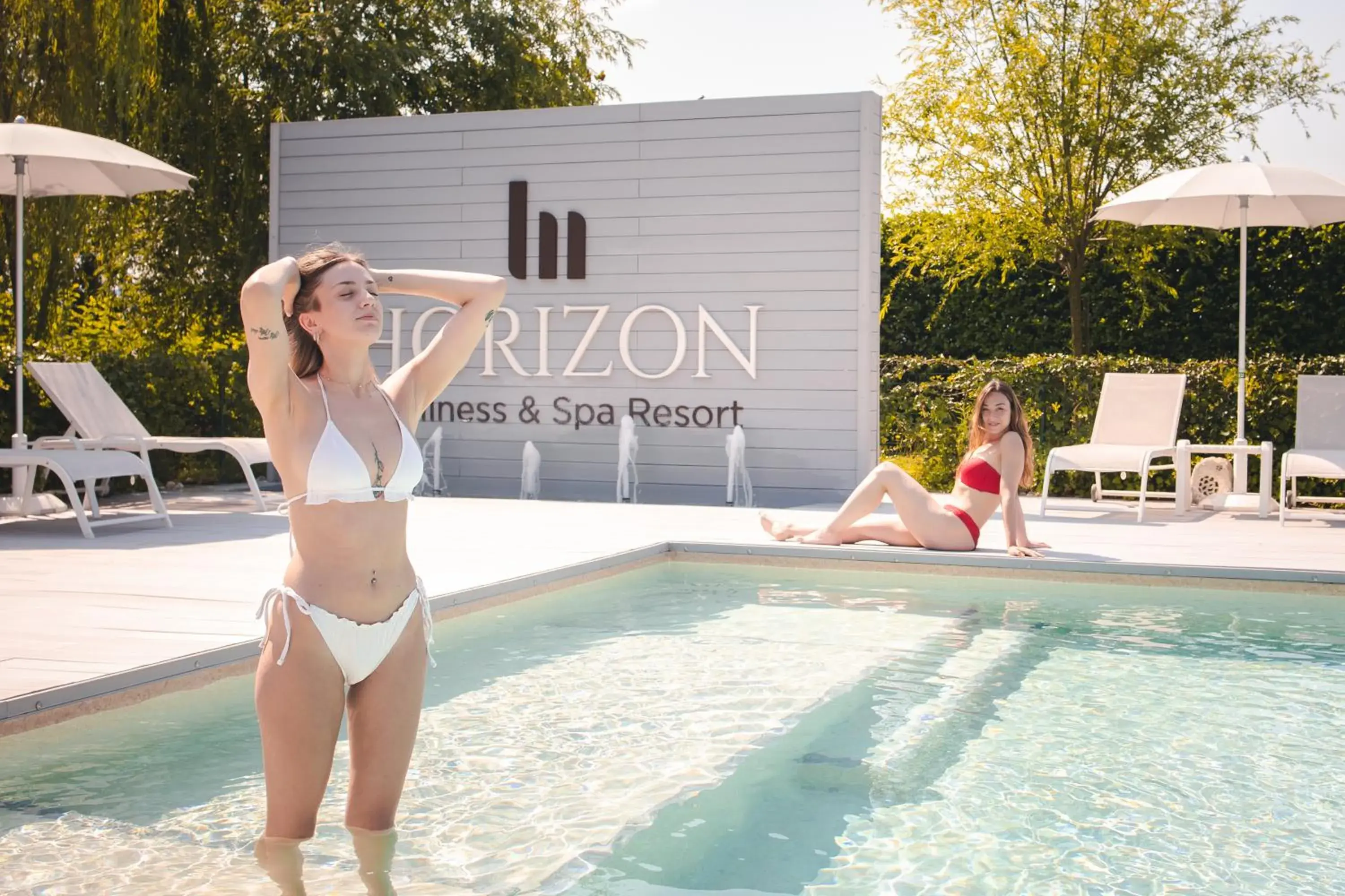 People, Swimming Pool in Hotel Horizon Wellness & Spa Resort; Best Western Signature Collection
