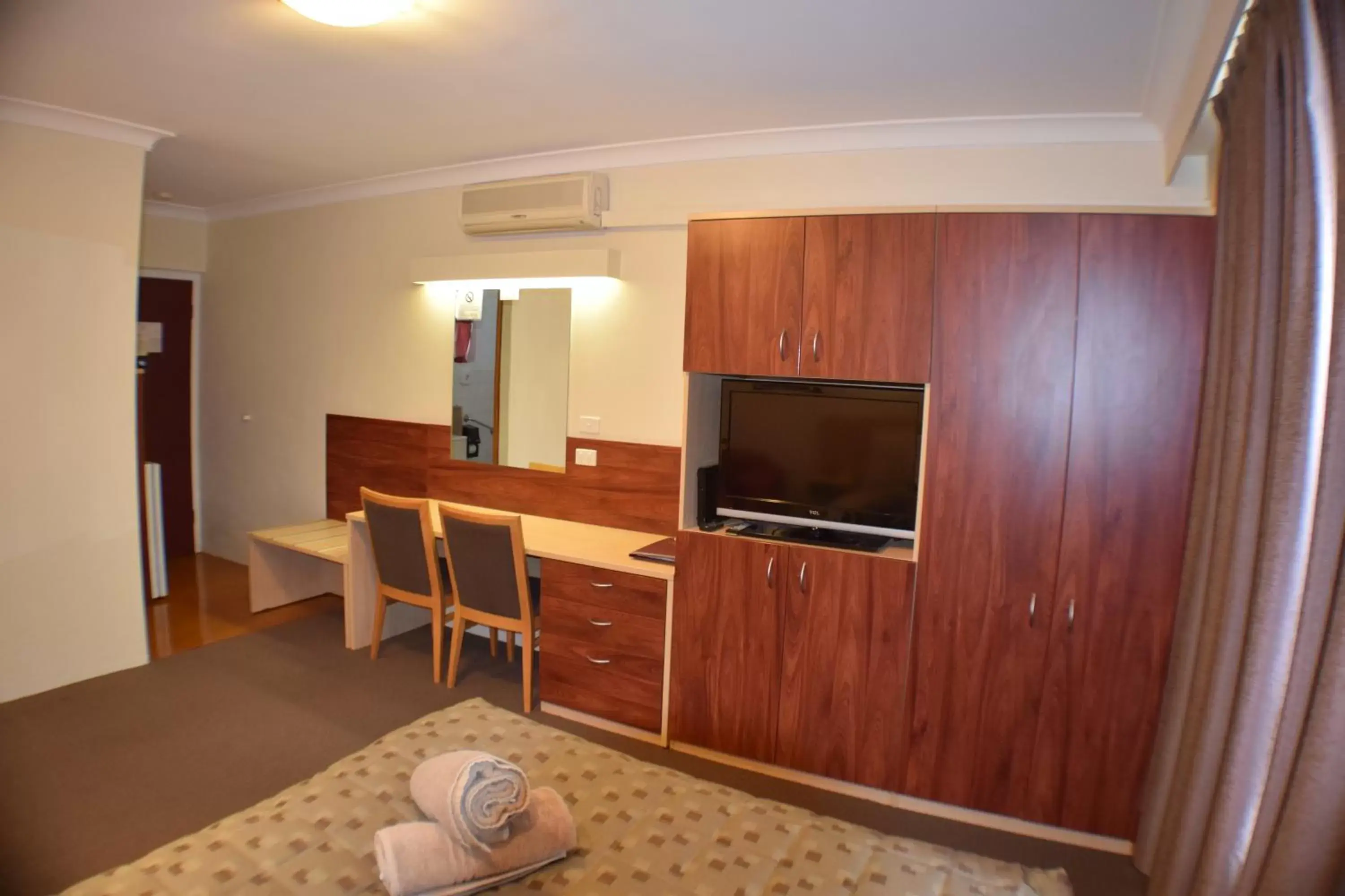 Decorative detail, TV/Entertainment Center in Acacia Motor Inn