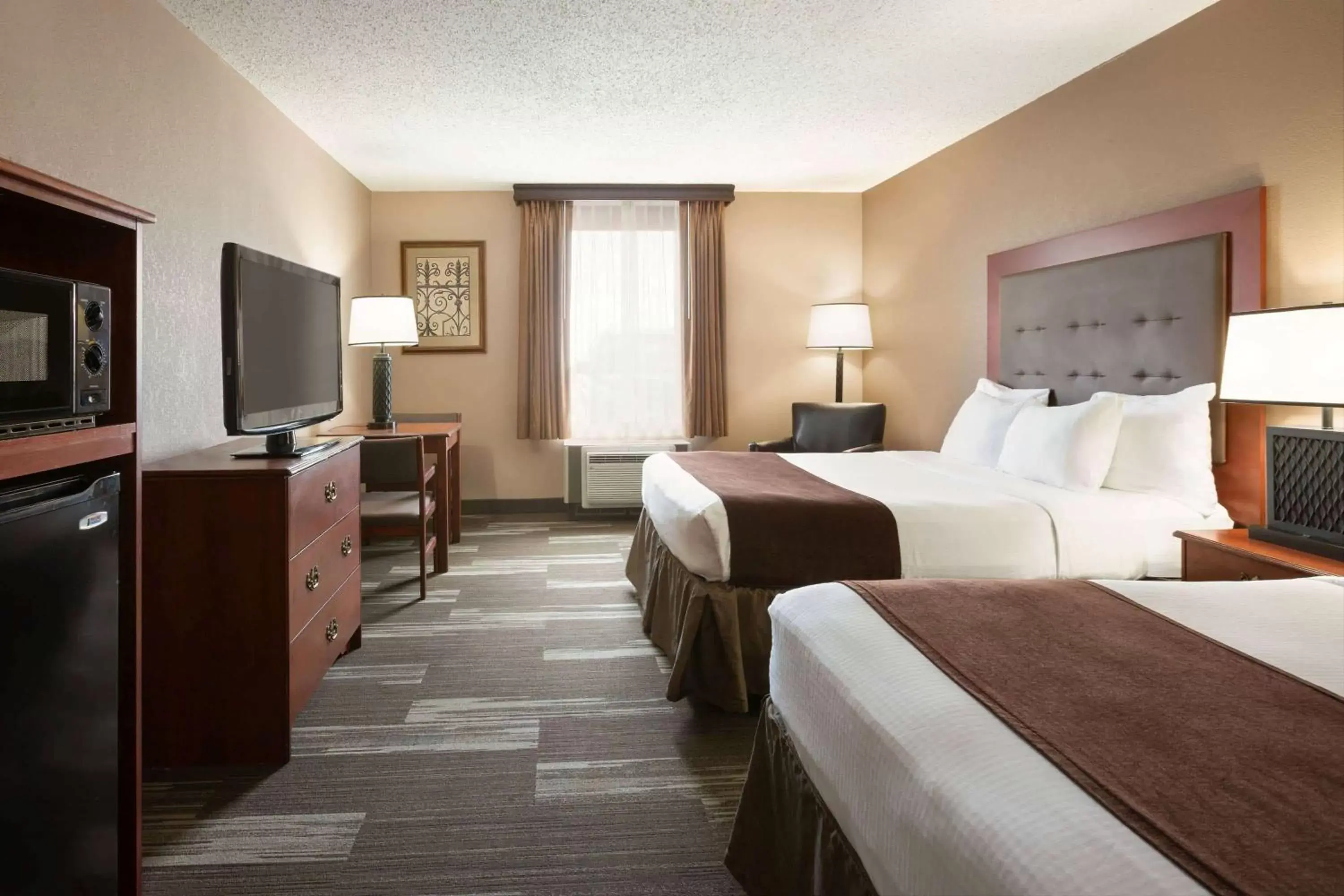 Photo of the whole room, Bed in Baymont by Wyndham Mandan Bismarck Area Photo of the whole room, Bed in Baymont by Wyndham Mandan Bismarck Area