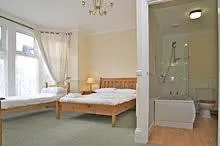 Bedroom in All Seasons Lodge Hotel