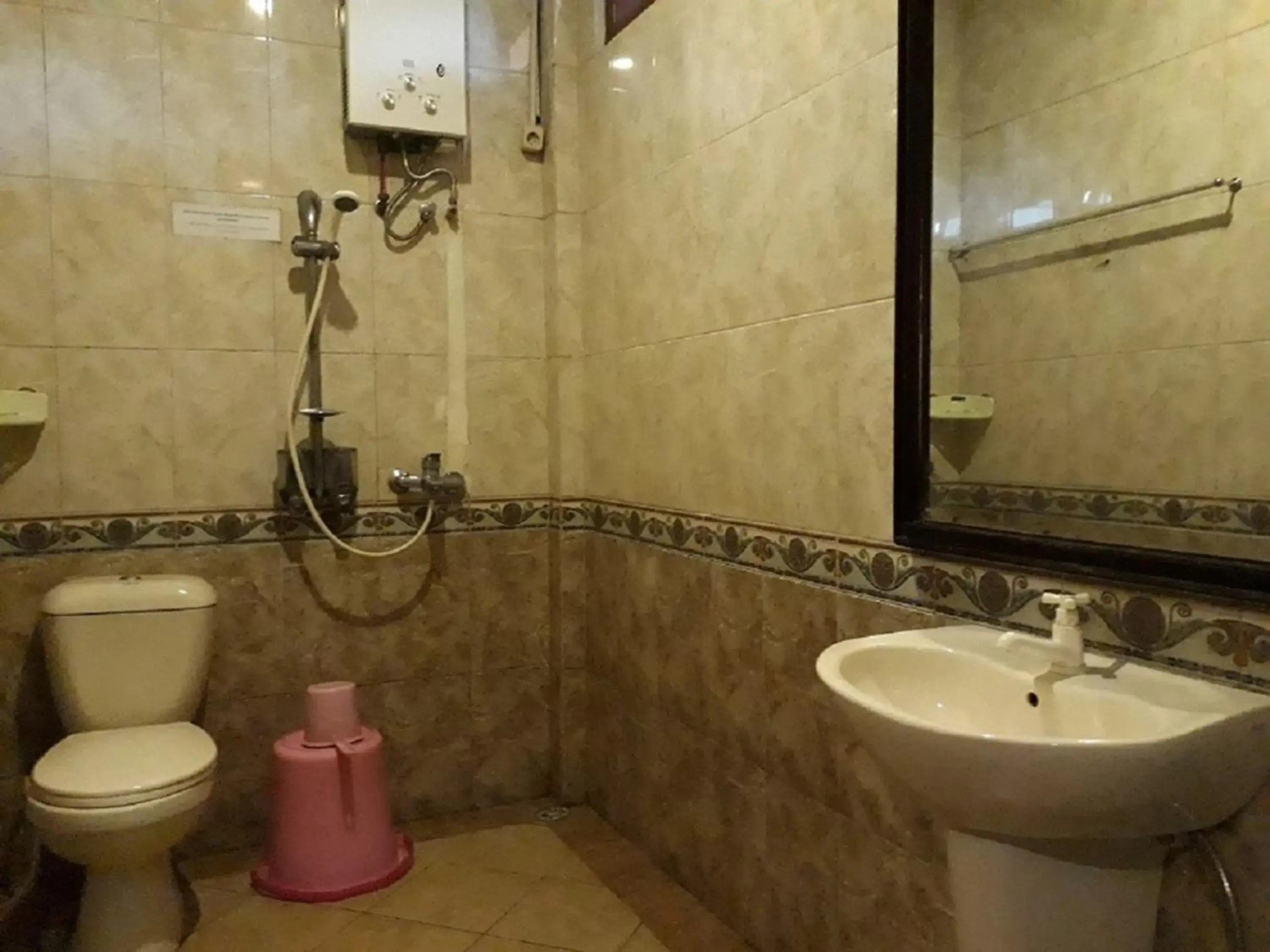 Bathroom in Orange Home Syariah