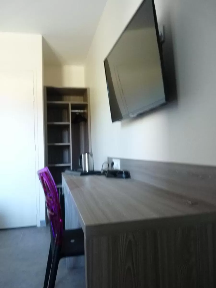 Seating area in L'Horloge Gourmande