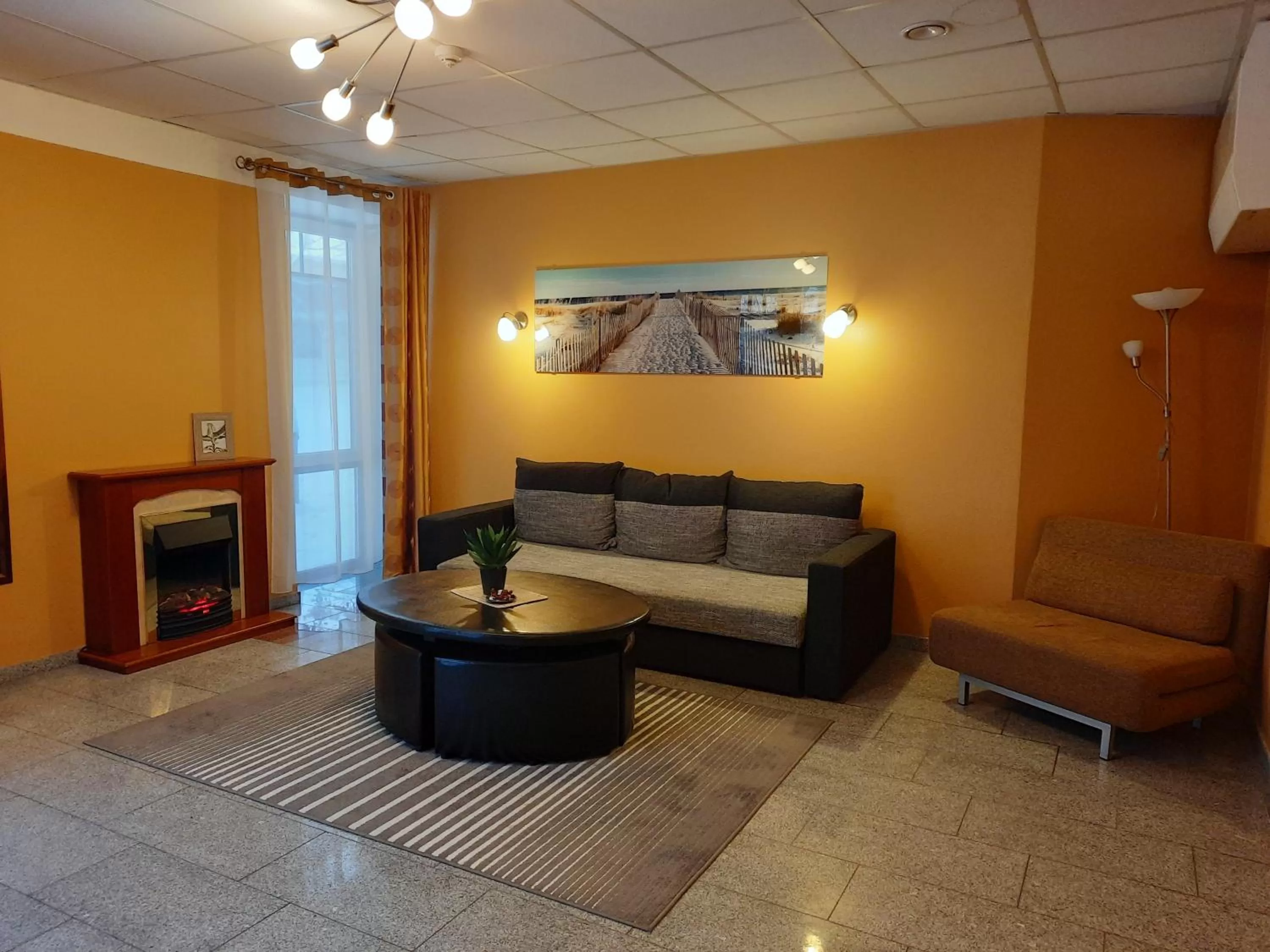 Living room in Hotel Pils with Self-Check in