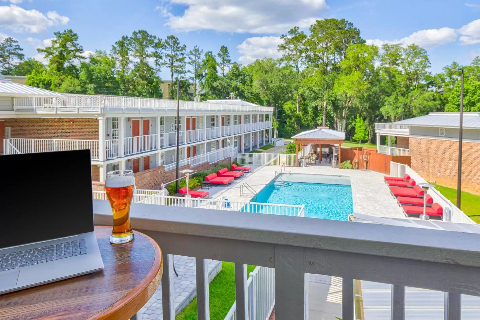 Property building, Pool View in Seven Hills Suites Tallahassee