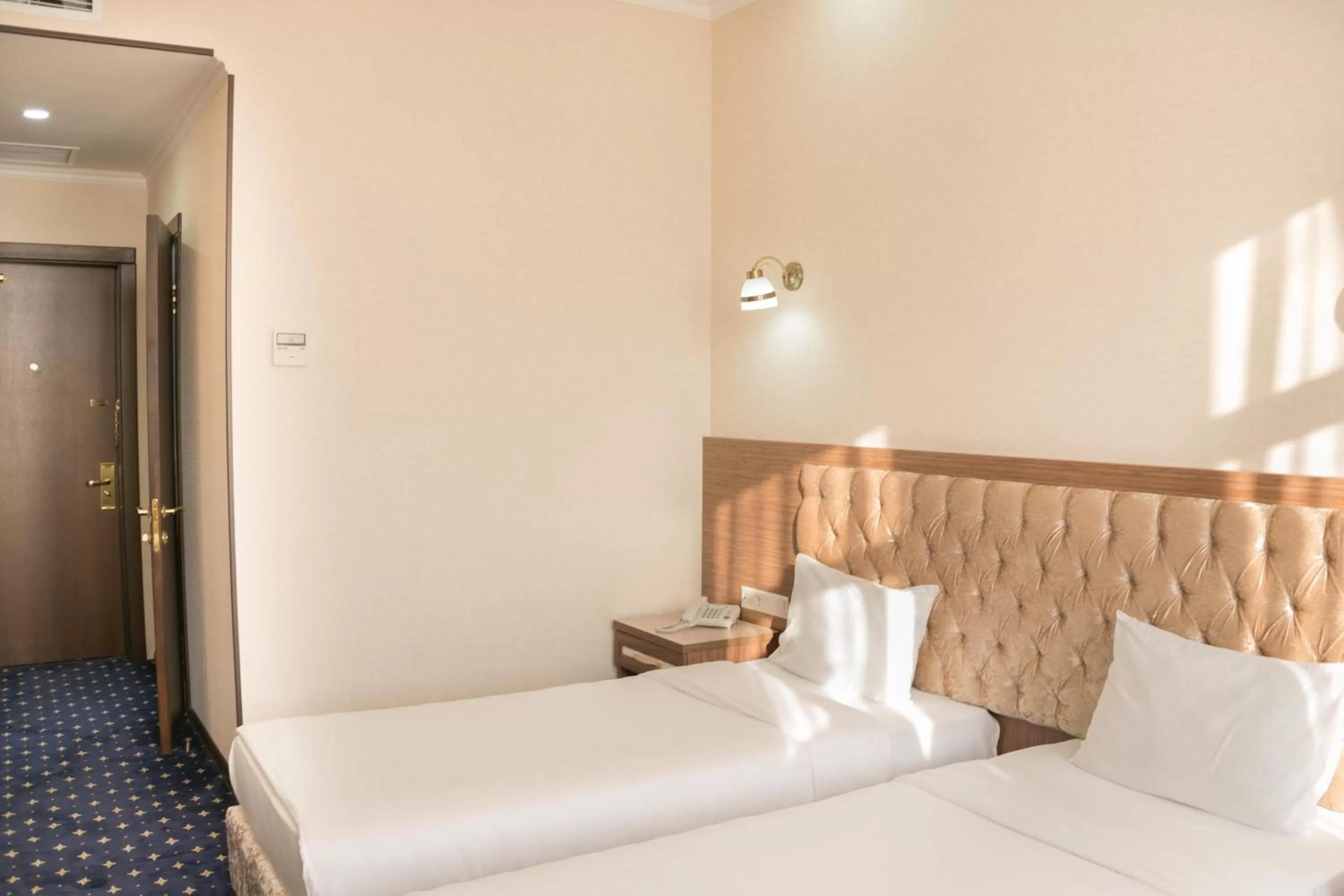 Bed in Hotel Khanaka