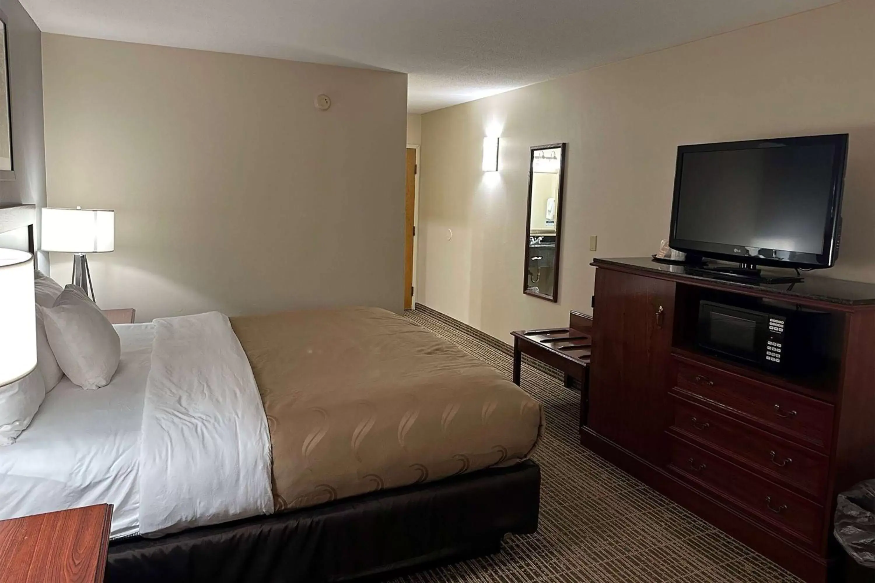 Photo of the whole room, Bed in Baymont by Wyndham South Bend Near Notre Dame