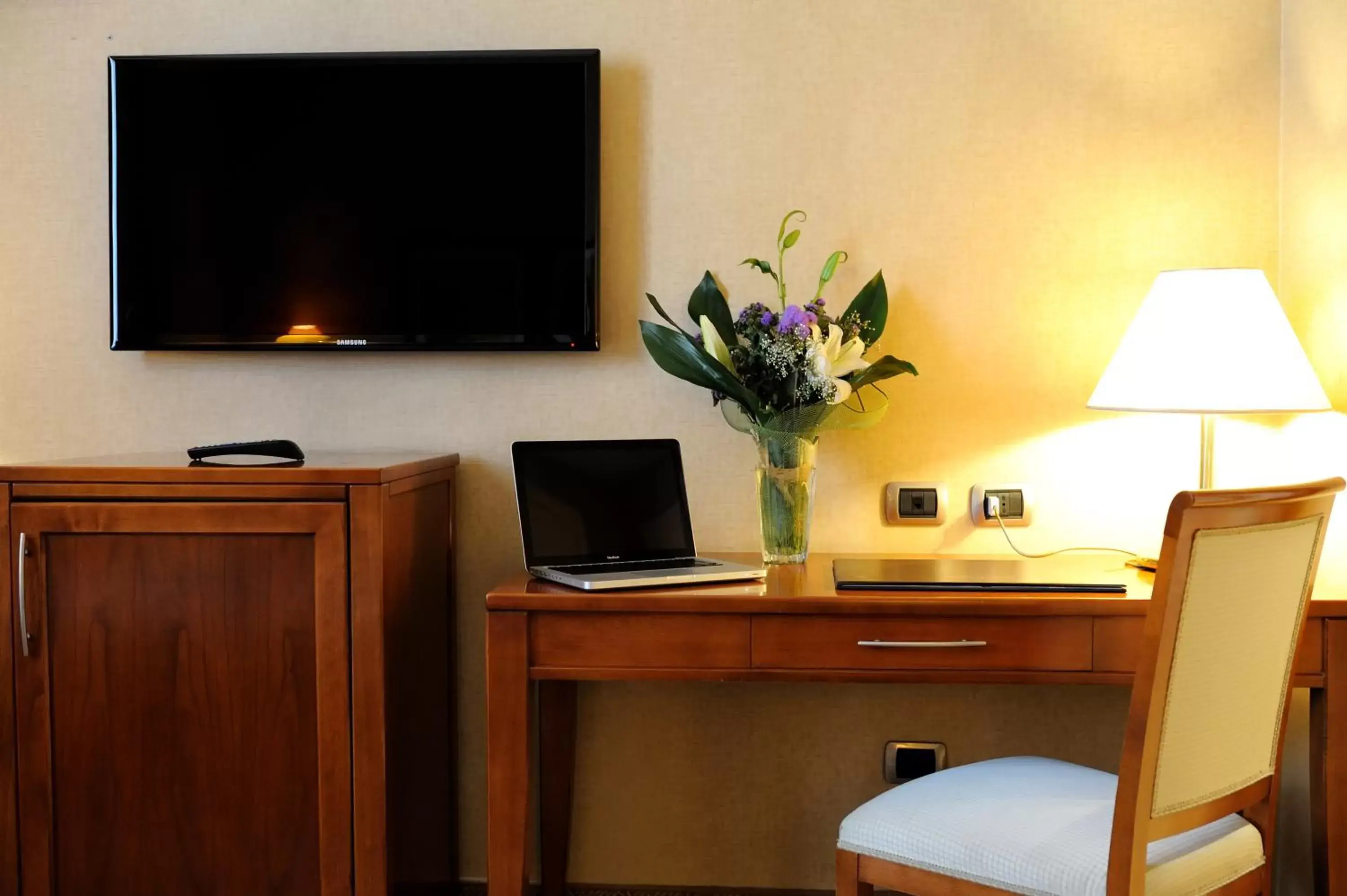 TV and multimedia, TV/Entertainment Center in LH Hotel Lloyd Roma
