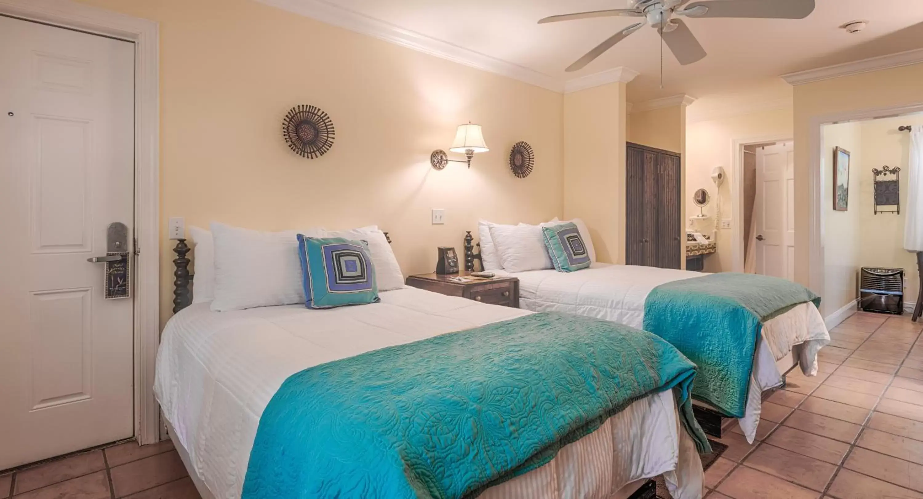 Bedroom, Bed in The Caribbean Court Boutique Hotel