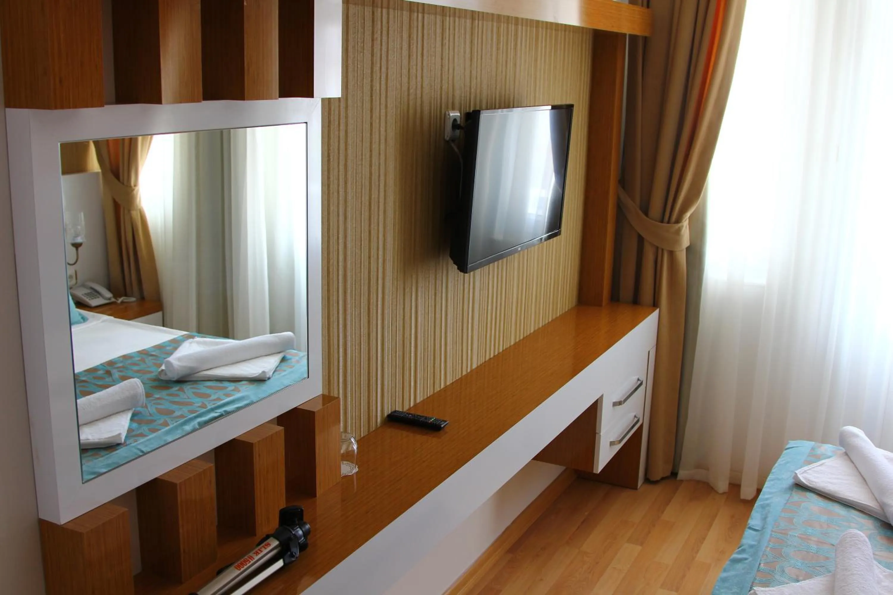 TV and multimedia, Bed in Esperanza Hotel