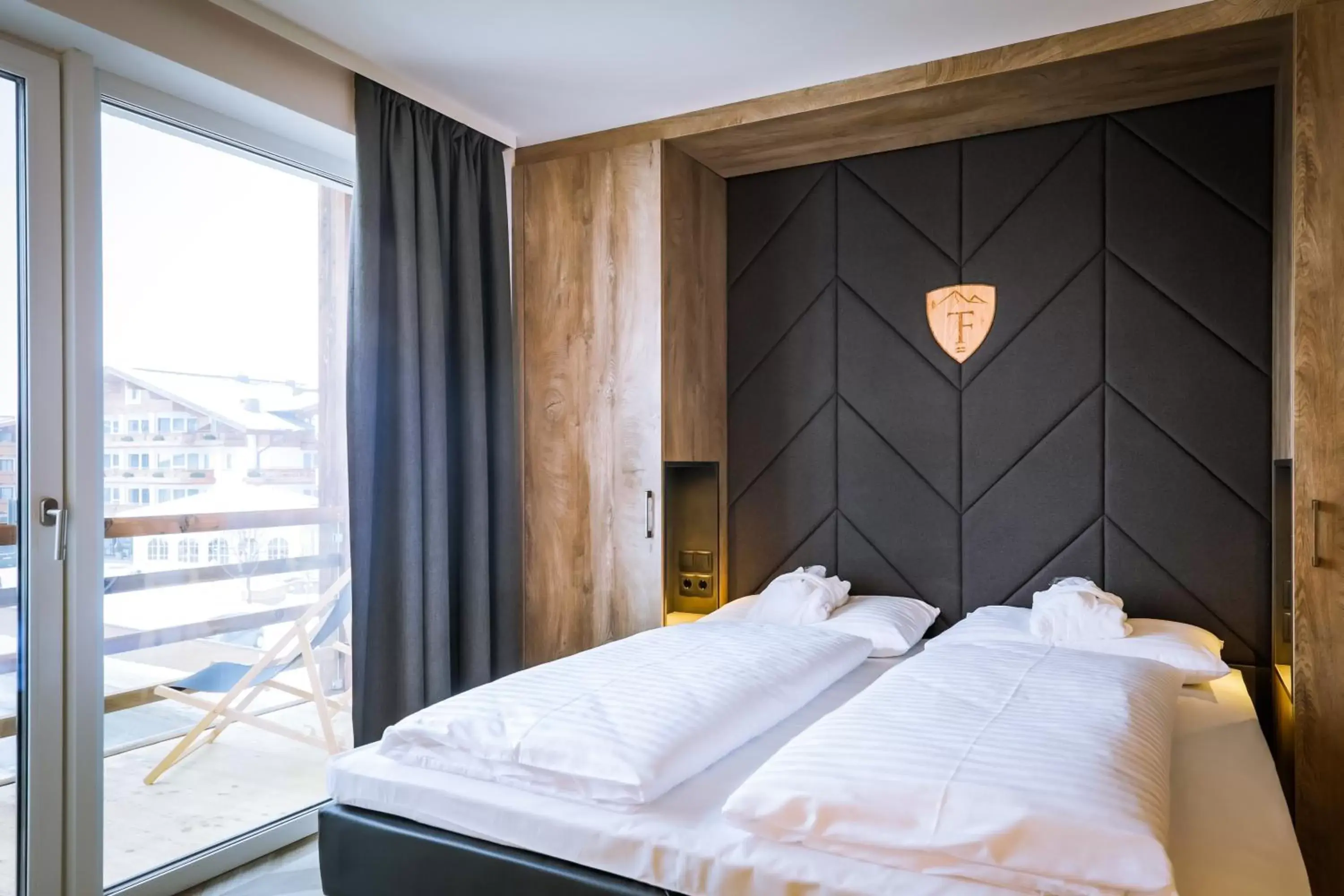 Photo of the whole room, Bed in 24 by AvenidA Hotel & Residences Kaprun