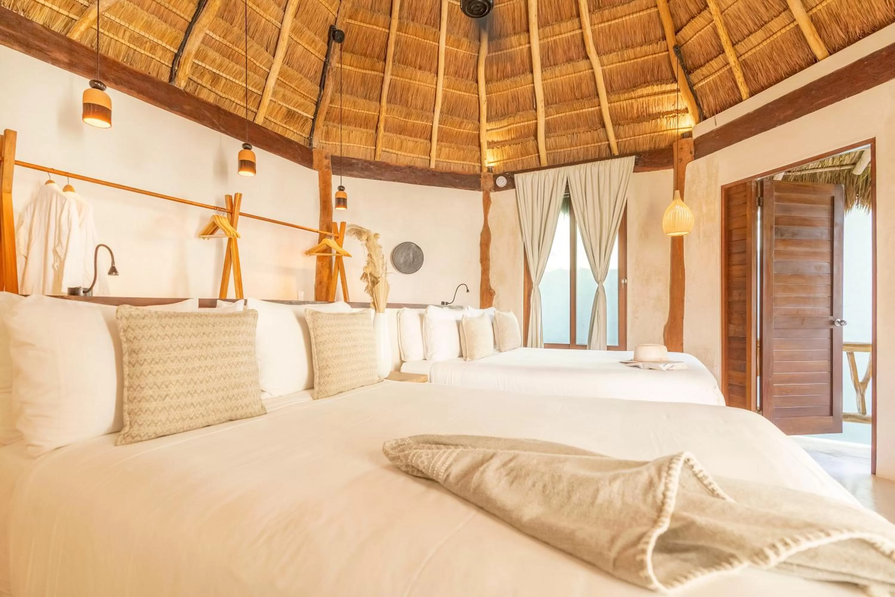 Bed in Casa Ganesh Tulum-Beachfront hotel by Ahau Collection