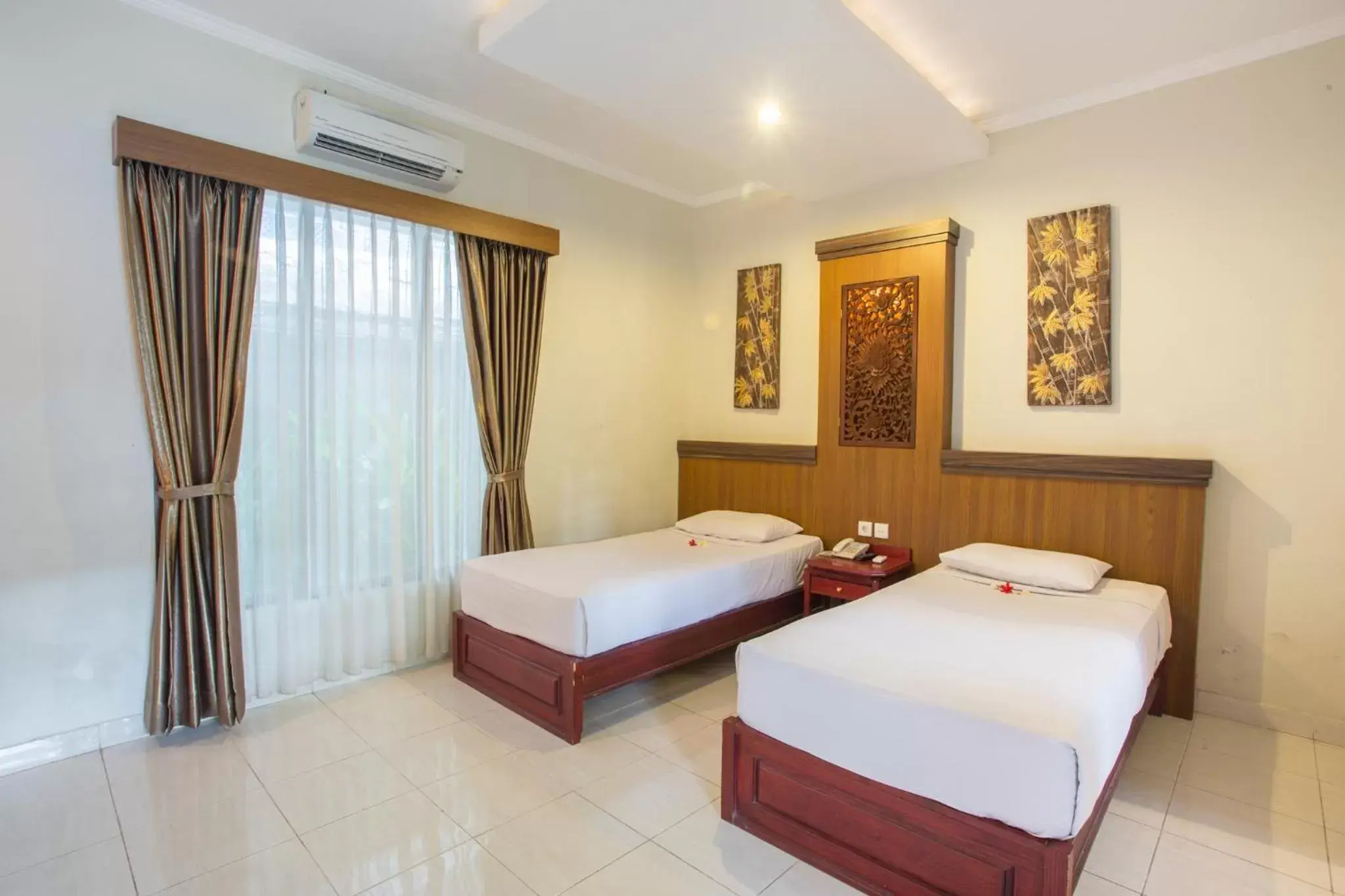 Bedroom, Bed in Sinar Bali Hotel