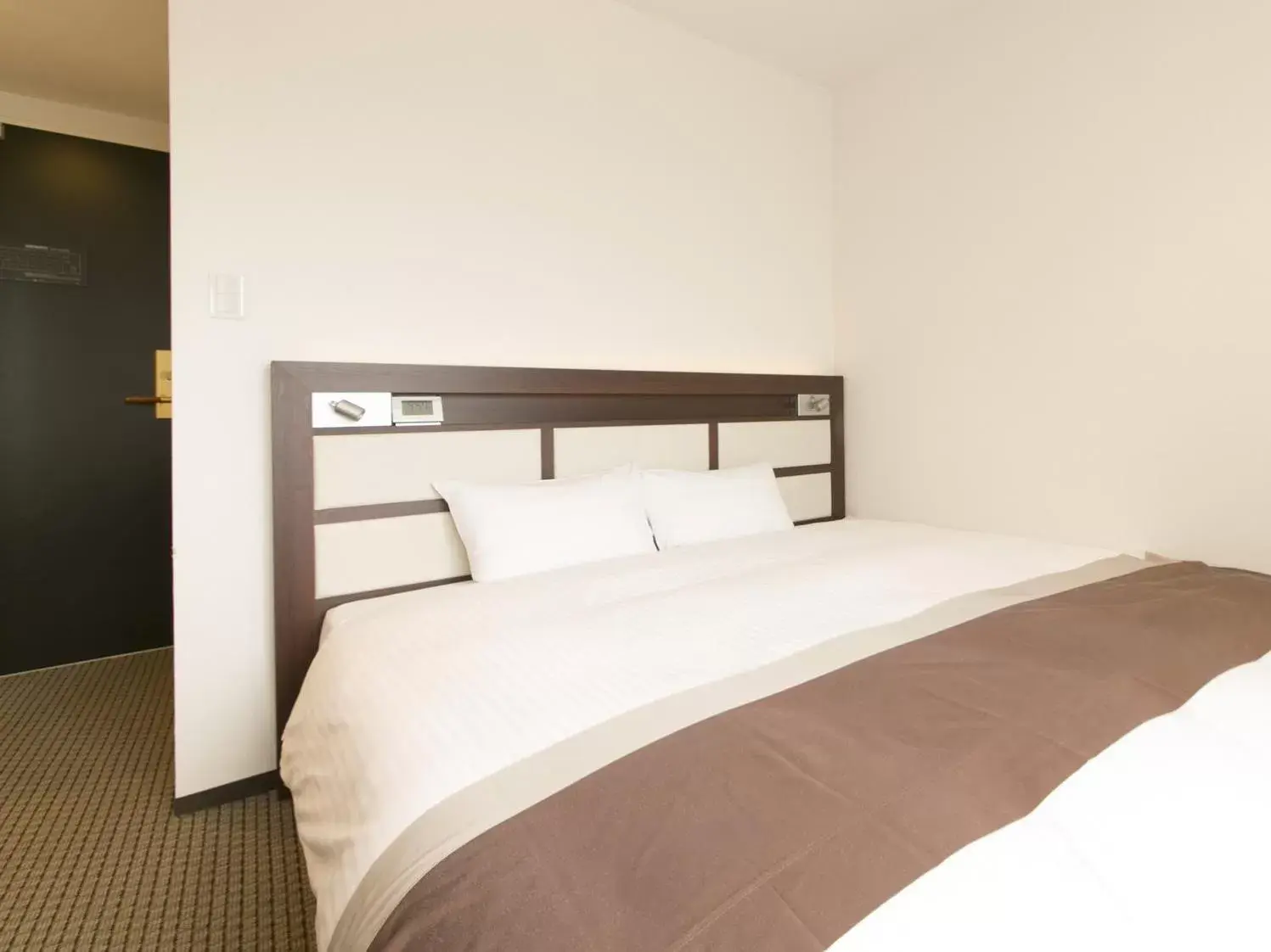 Bed in Urban Hotel Minami Kusatsu Bed in Urban Hotel Minami Kusatsu