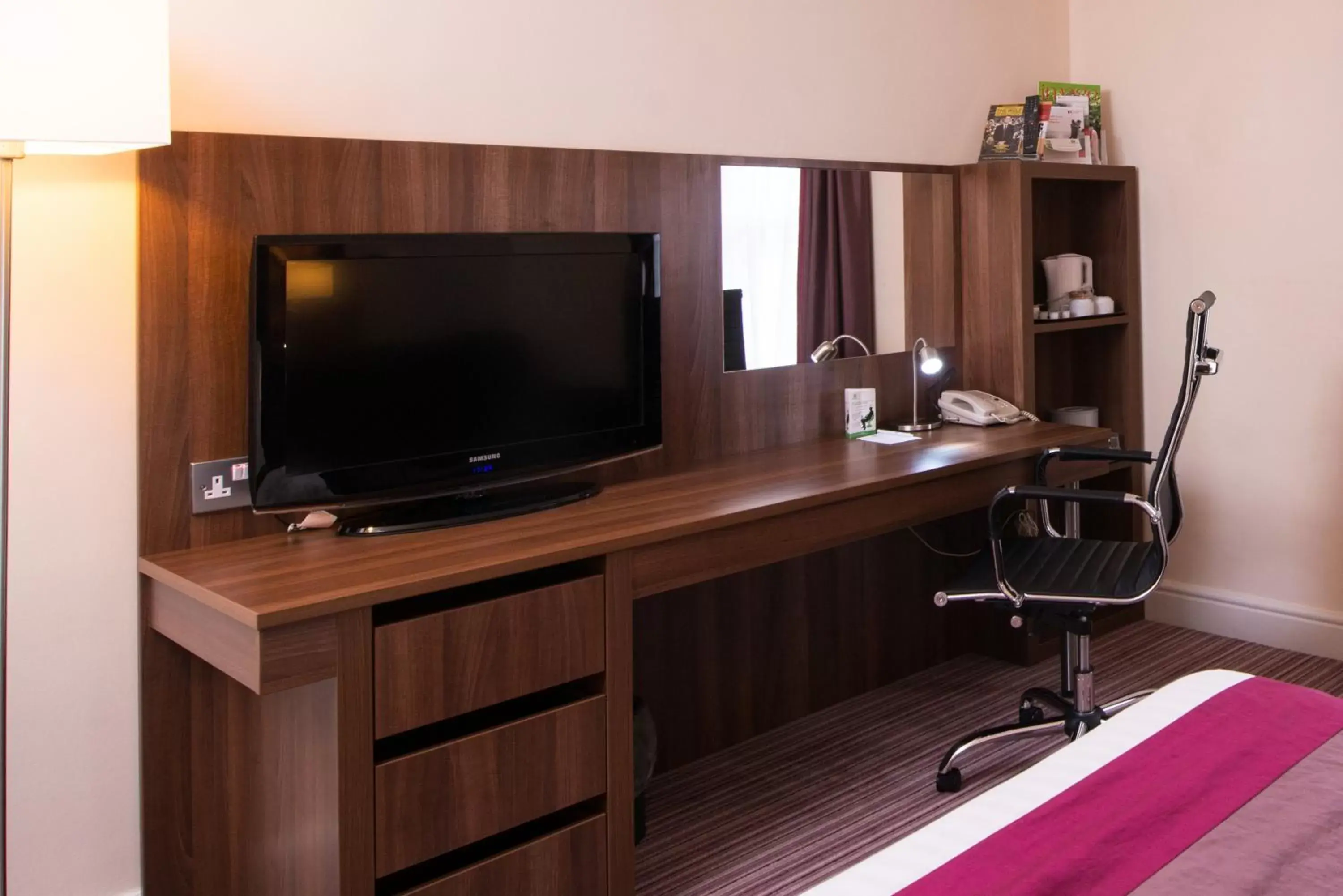Photo of the whole room, TV/Entertainment Center in Holiday Inn Milton Keynes East M1 Junc 14, an IHG Hotel