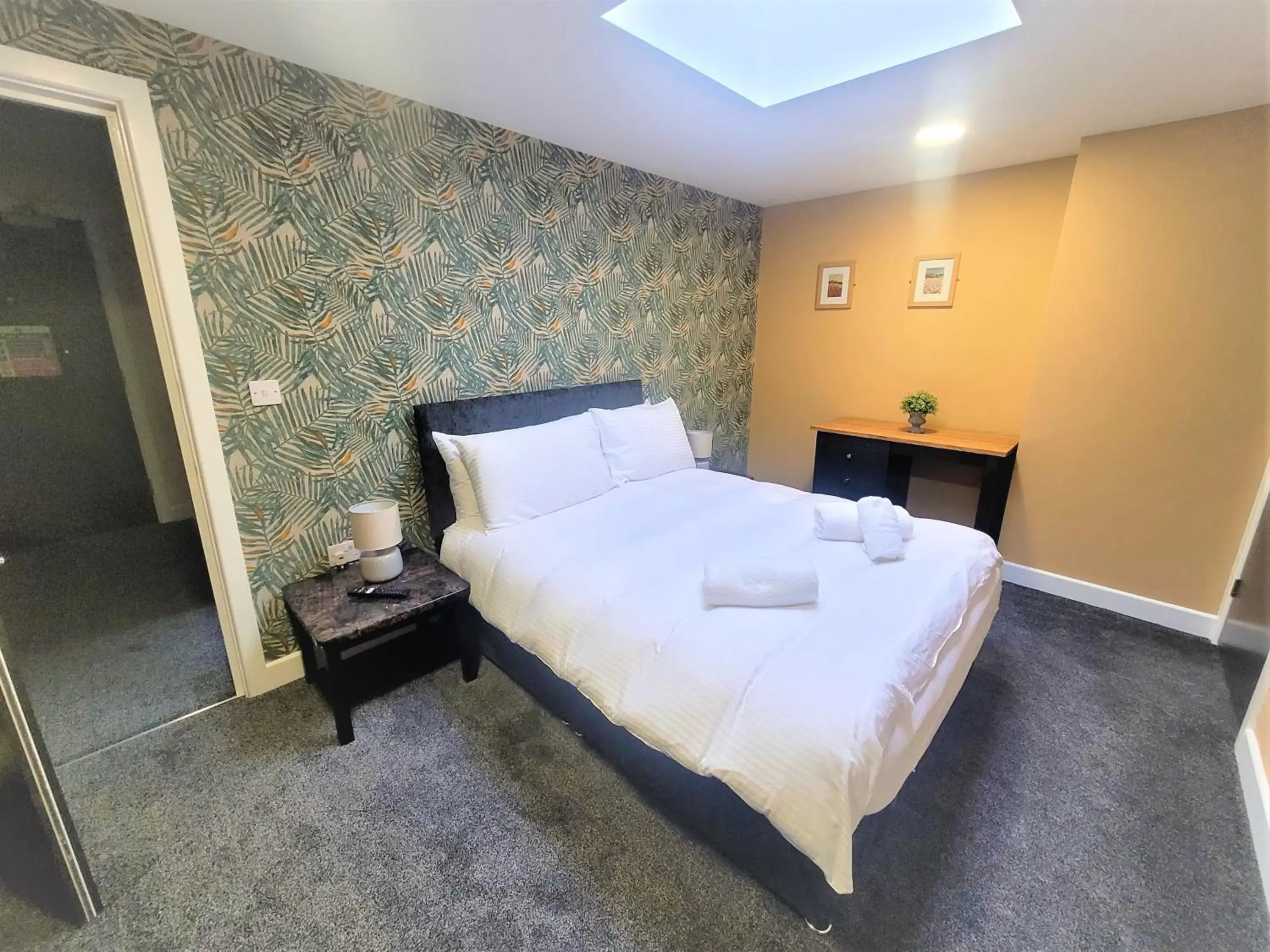 Bed in New County Hotel & Serviced Apartments by RoomsBooked