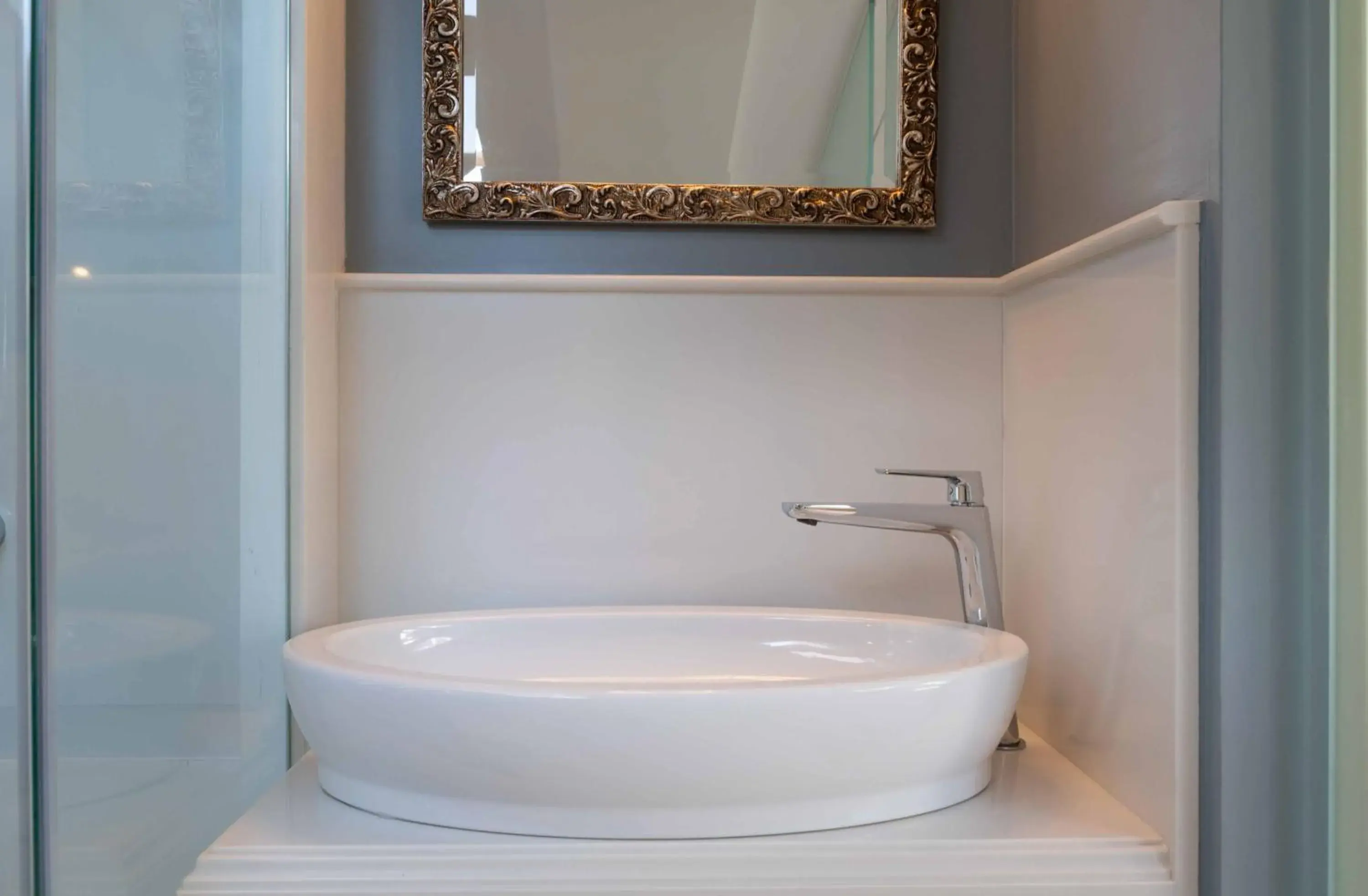 Bathroom in Noble Suites