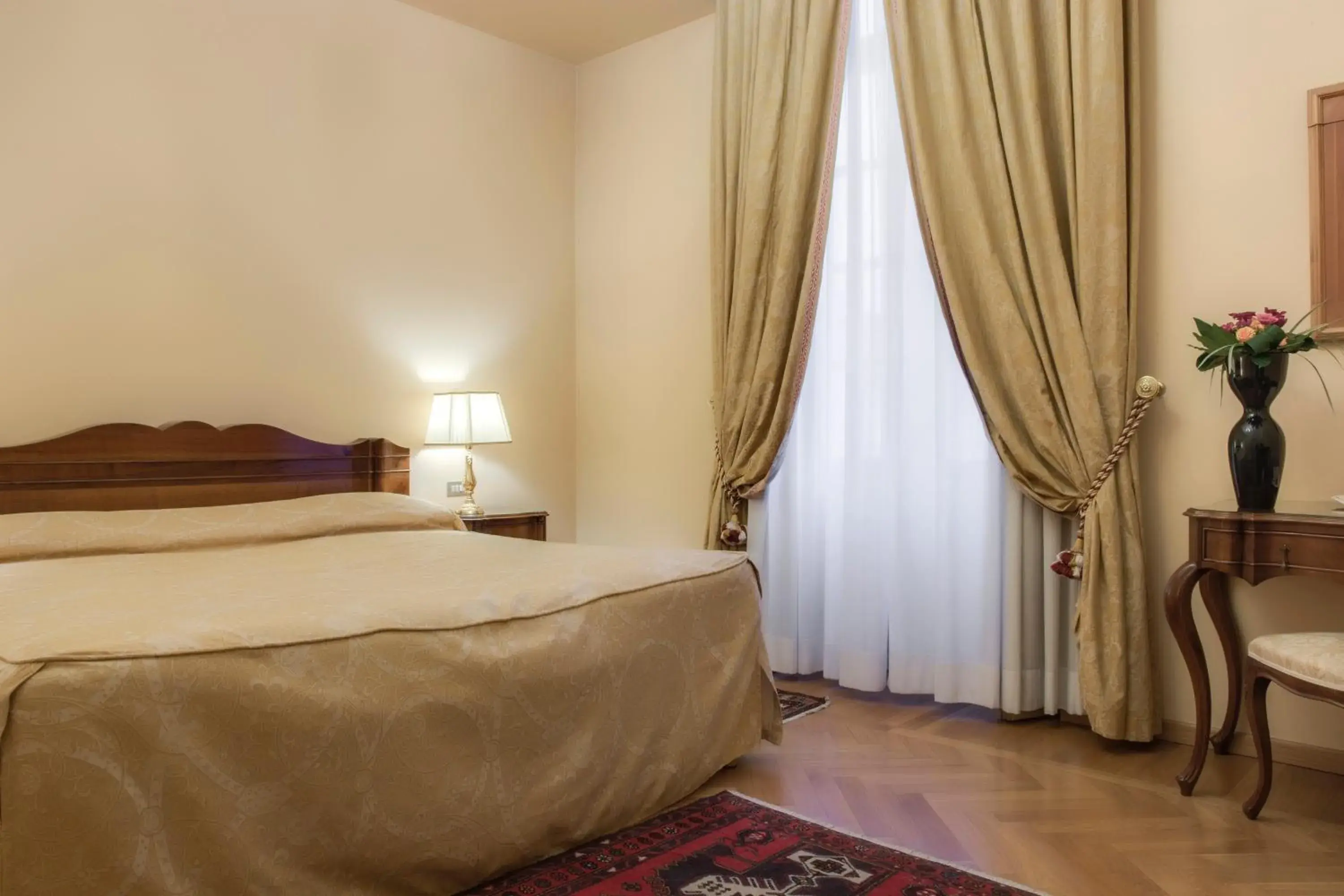 Bed in Villa Fenaroli Palace Hotel