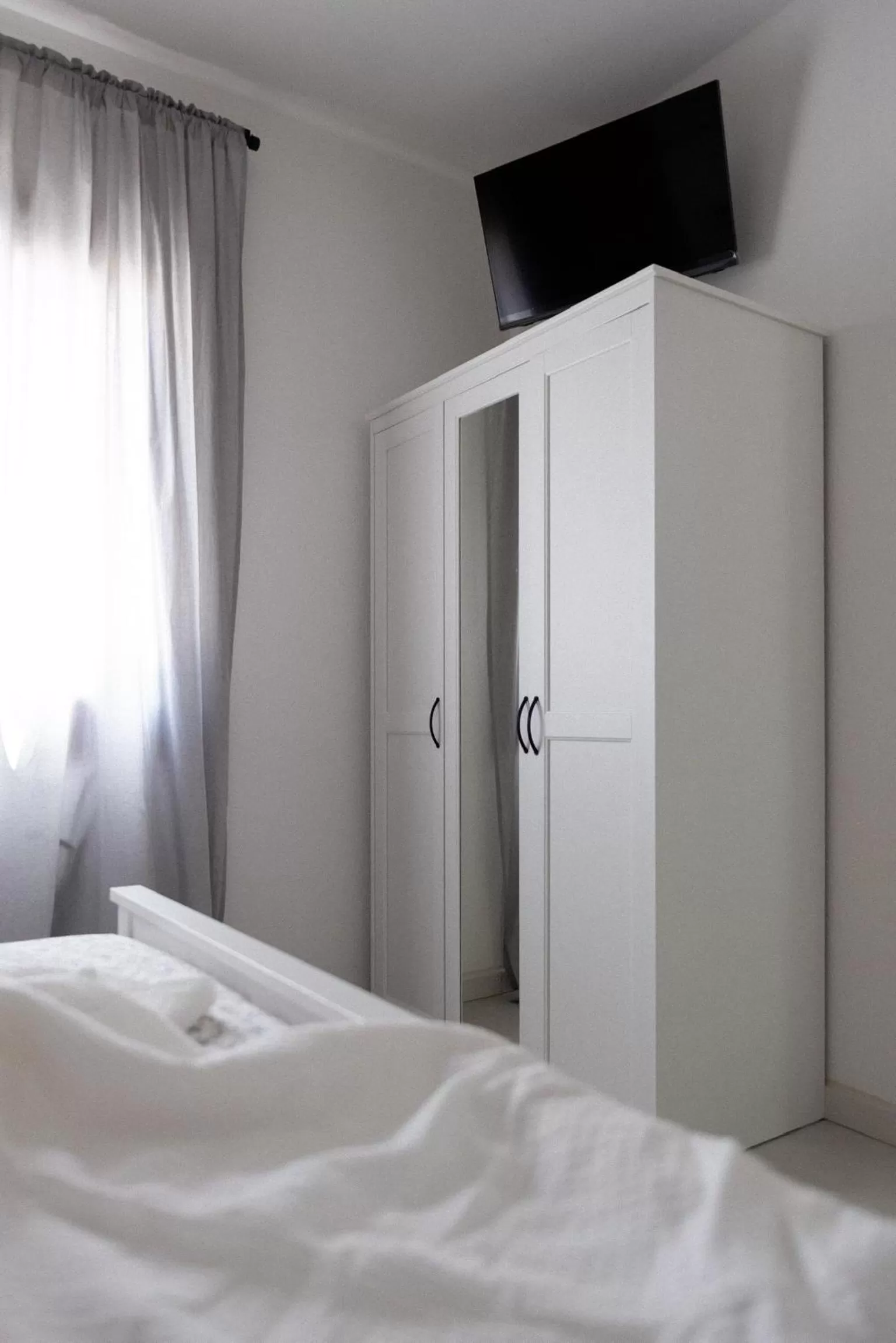 Bed, TV/Entertainment Center in Tortora bed and breakfast