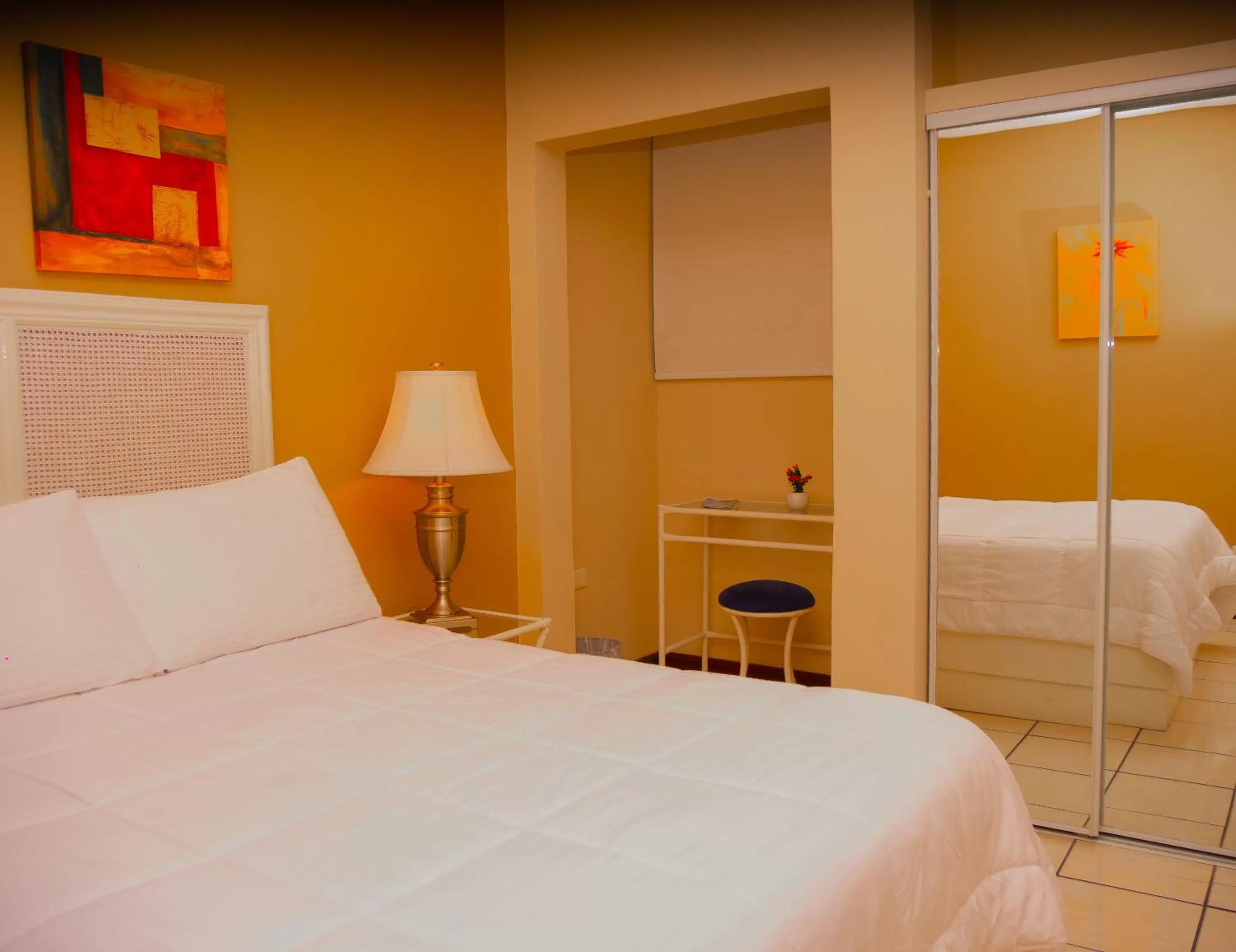 Bed in Hotel Bamboo Aeropuerto