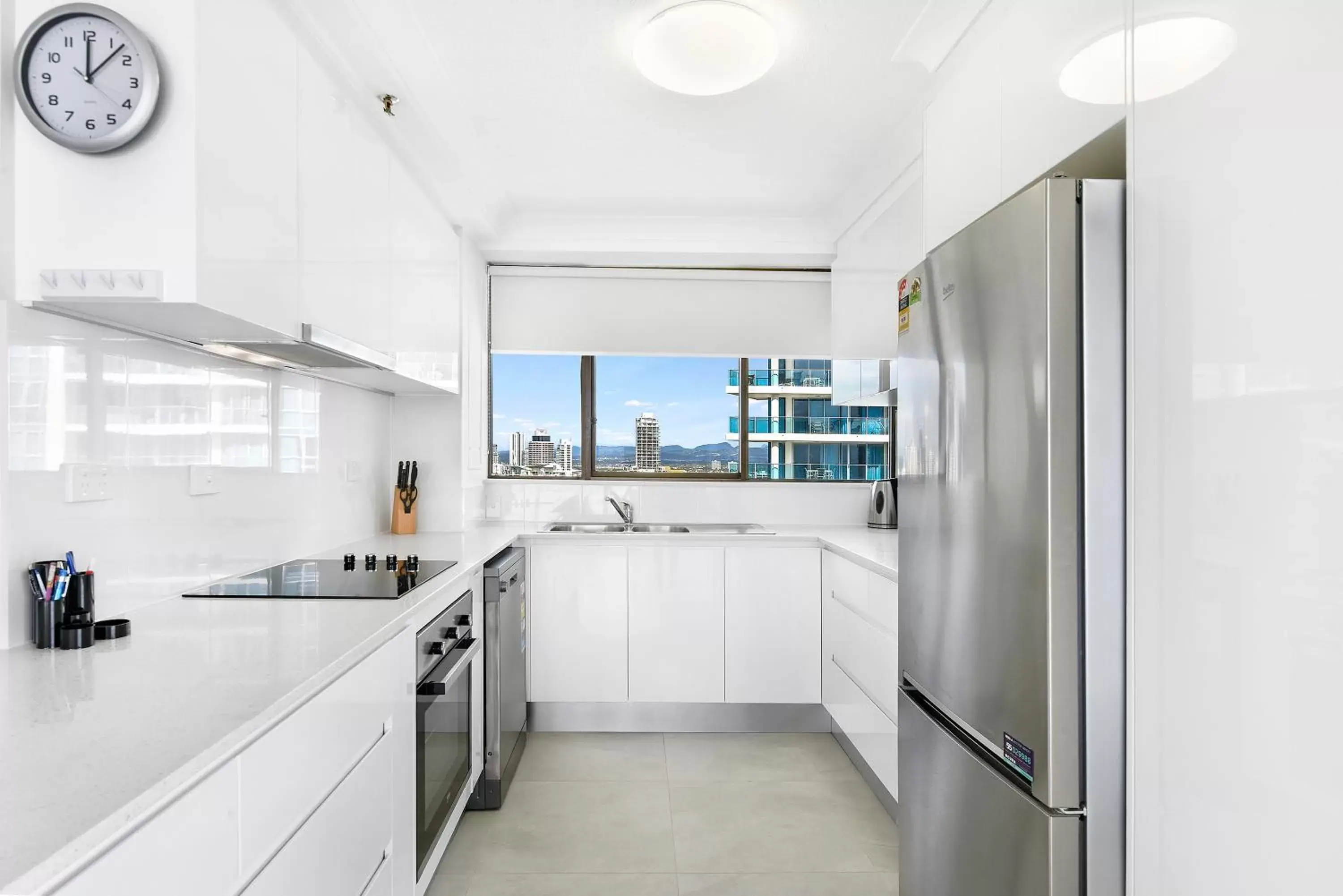 Kitchen/Kitchenette in Surfers Century Oceanside Apartments