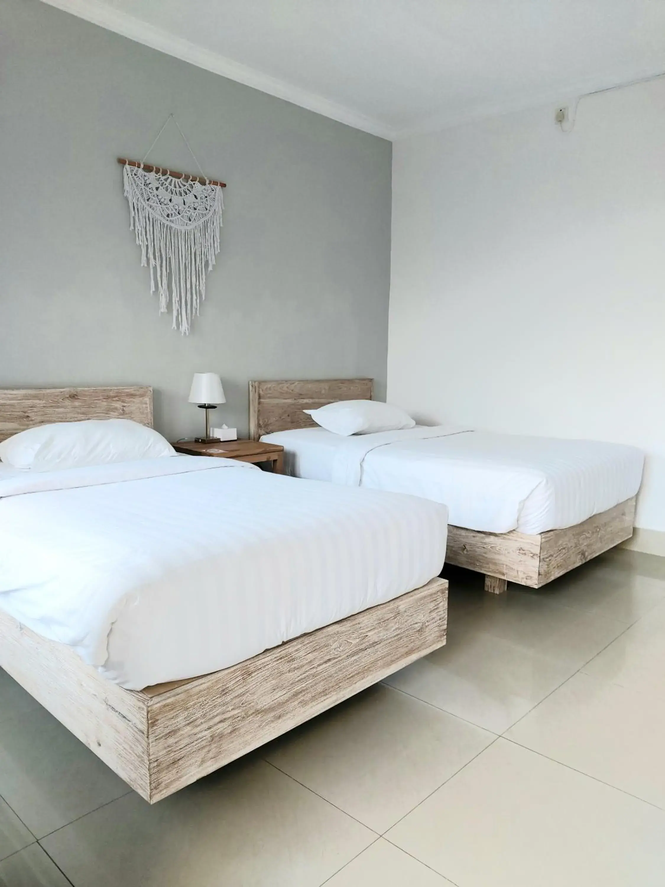 Bed in Radha Bali Hotel