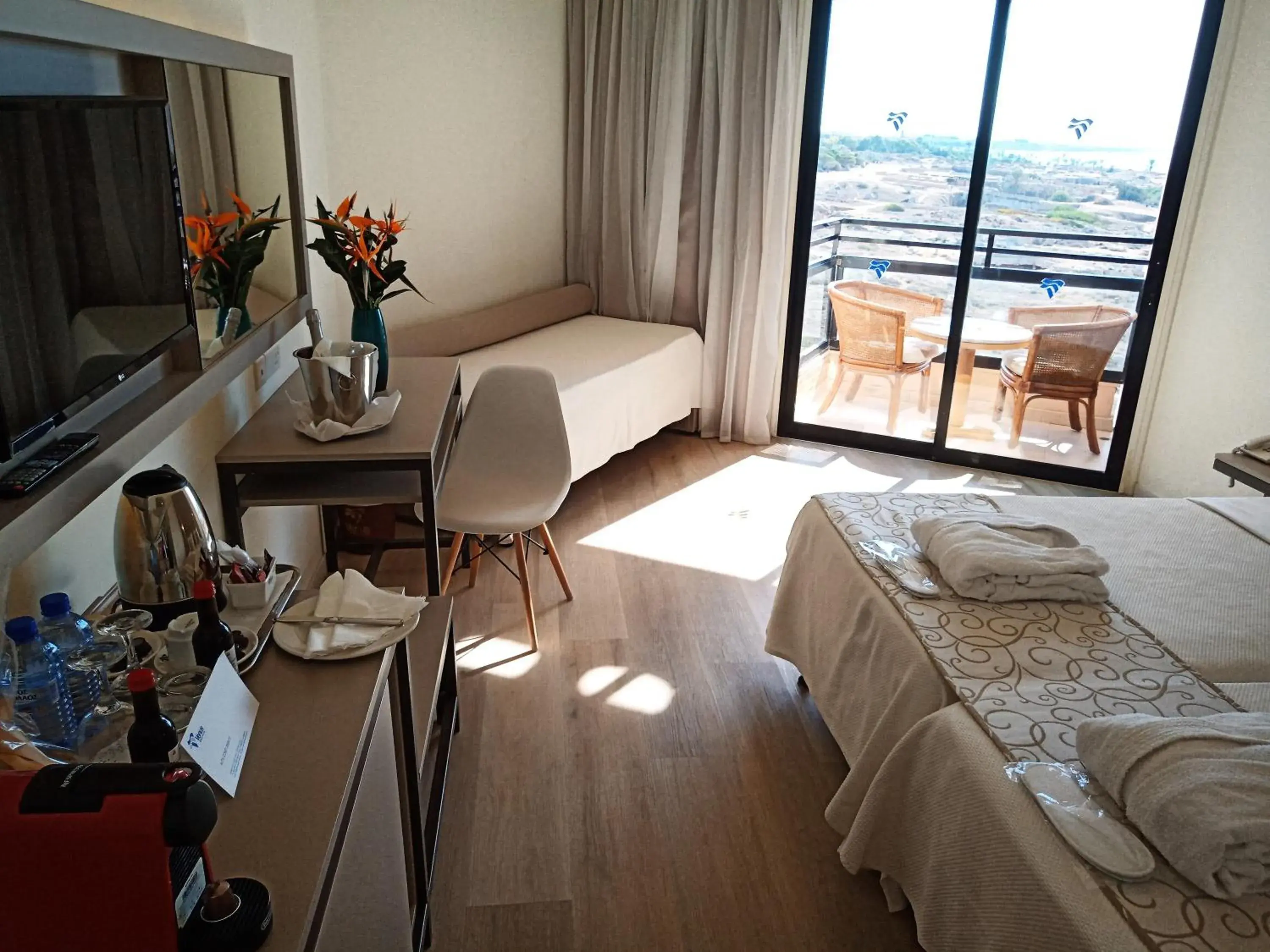 Bedroom, Seating Area in Venus Beach Hotel