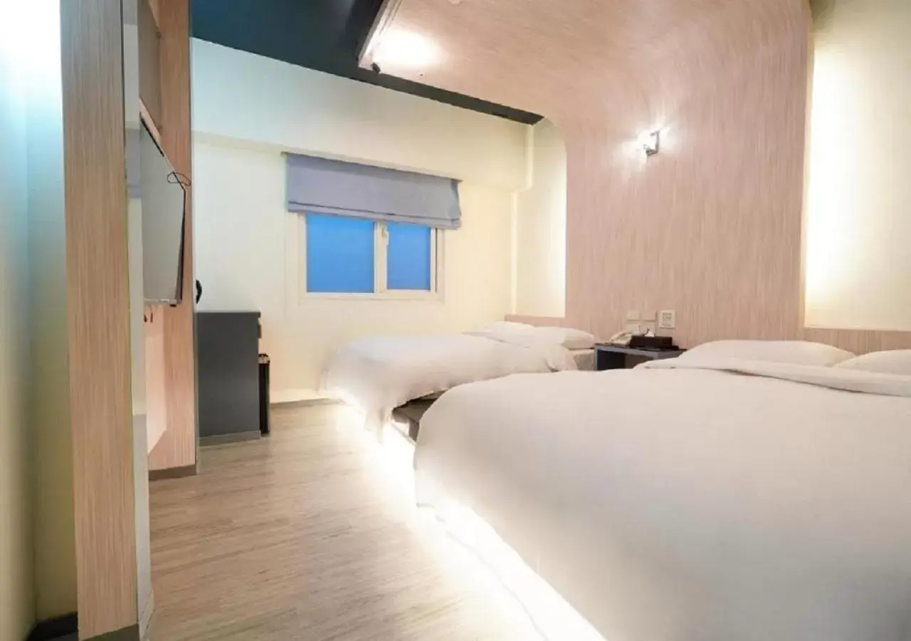 Photo of the whole room, Bed in Walker Hotel - Chenggong Photo of the whole room, Bed in Walker Hotel - Chenggong