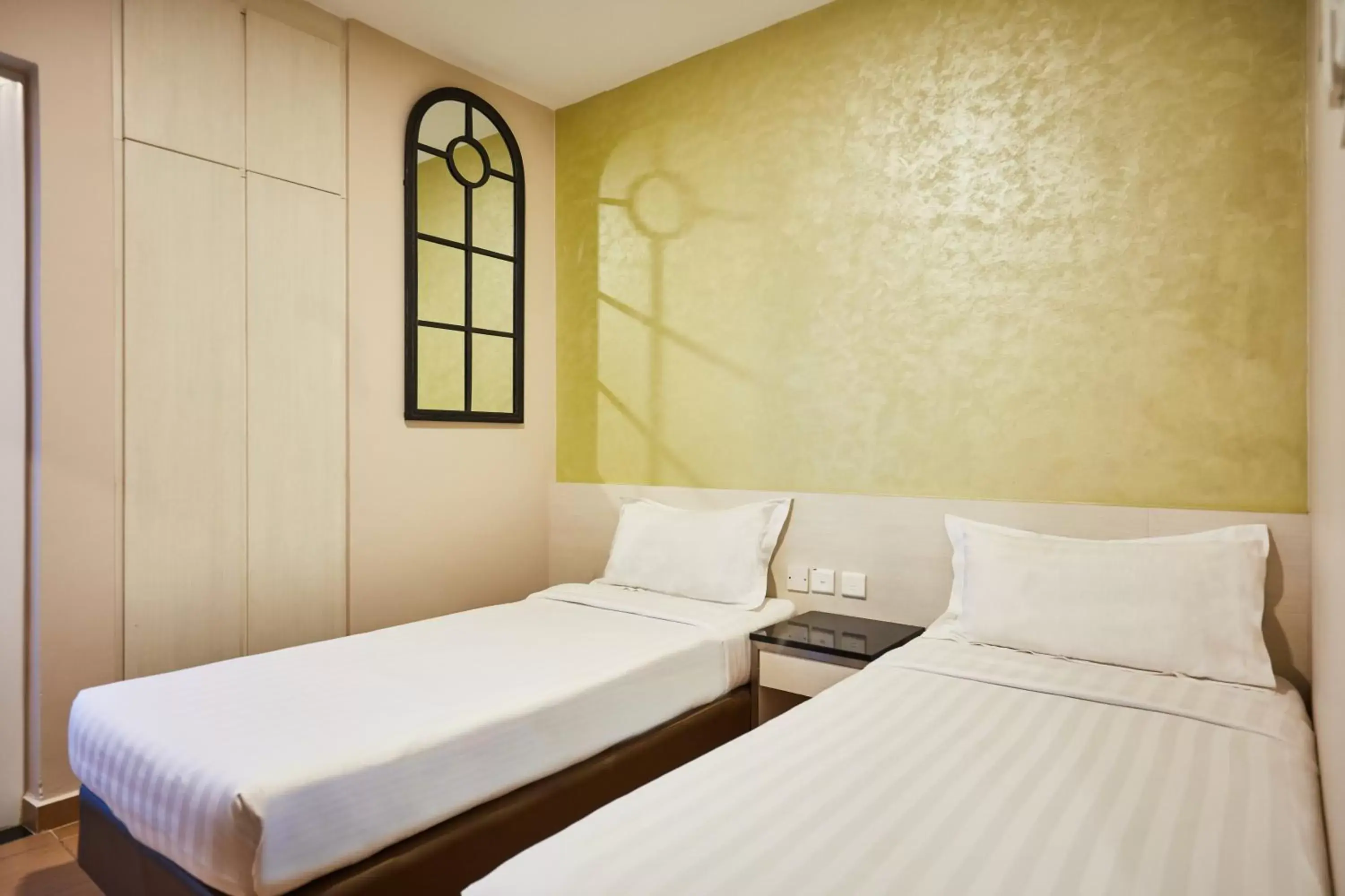 Bed in Ibis Budget Singapore West Coast