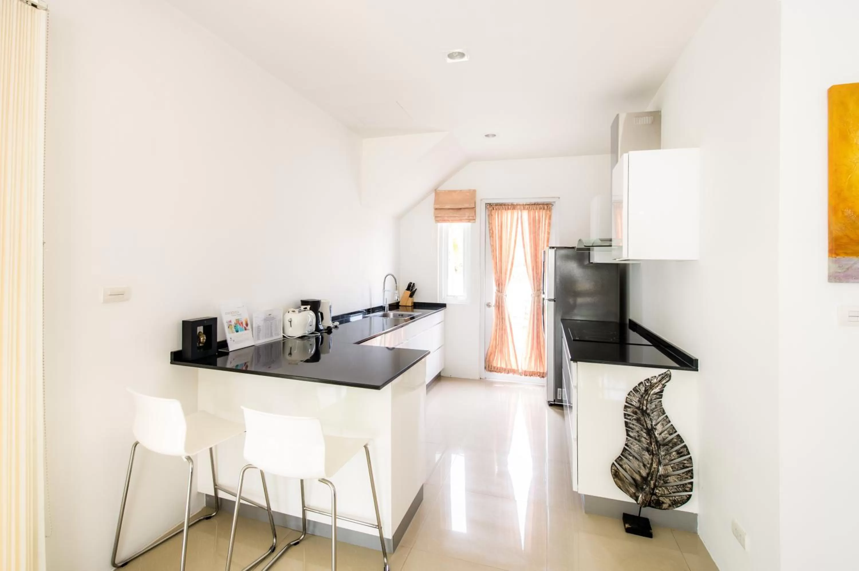 Kitchen or kitchenette in Oriental Beach Pearl Resort