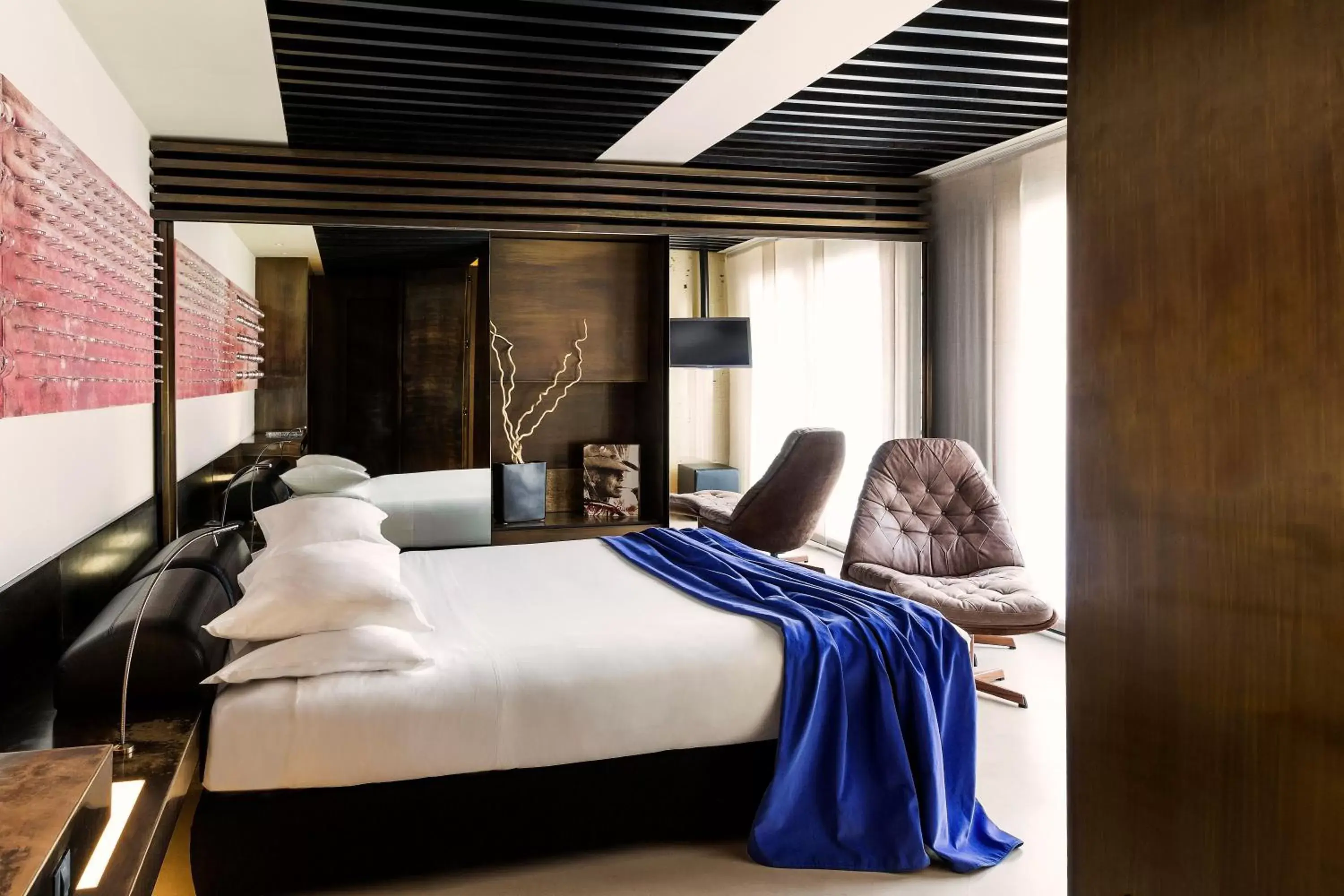 Bed in STRAF, Milan, a Member of Design Hotels