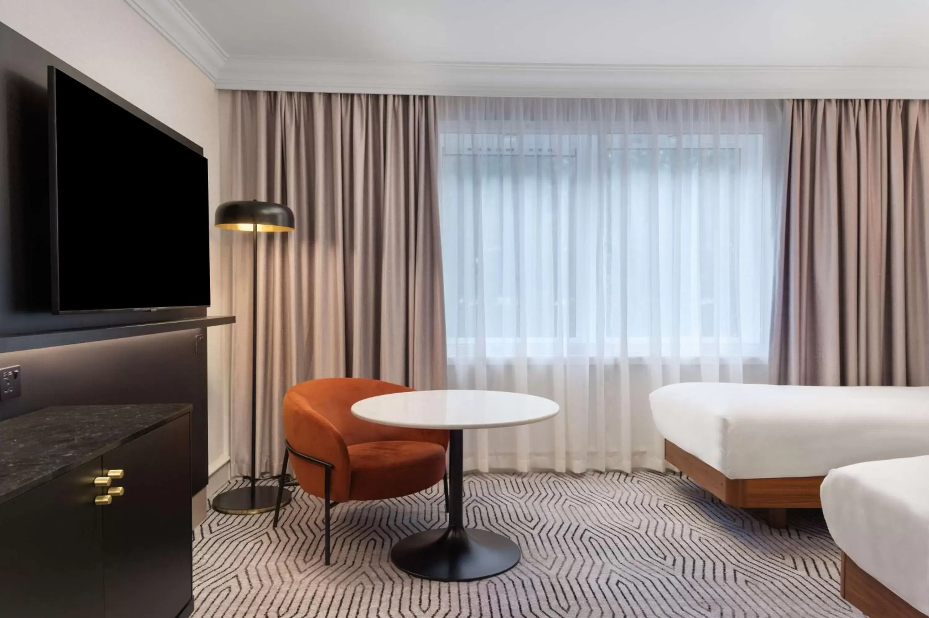 Bedroom, Seating Area in Hilton London Olympia