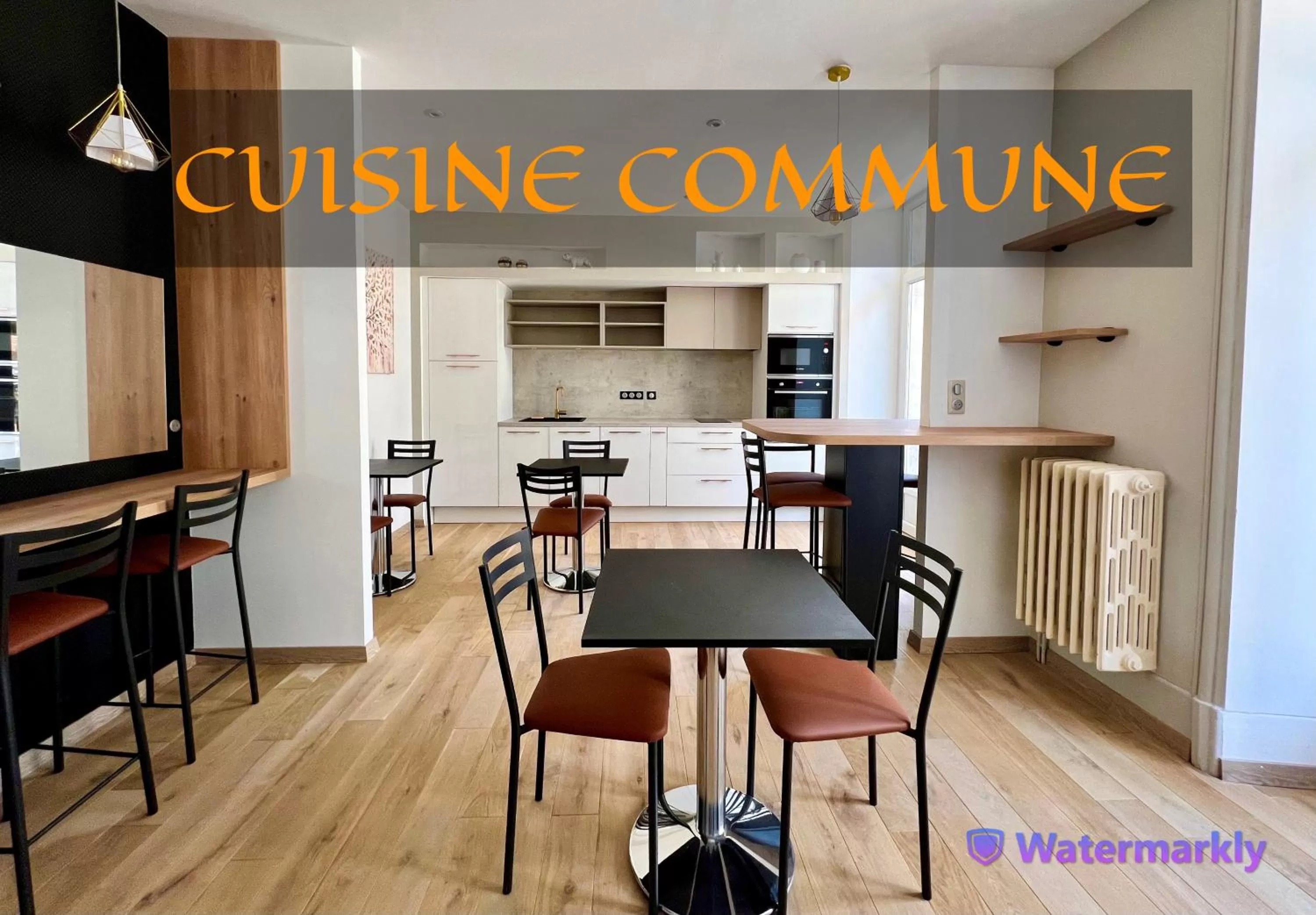 Communal kitchen in Appart'hôtel Les Célestins