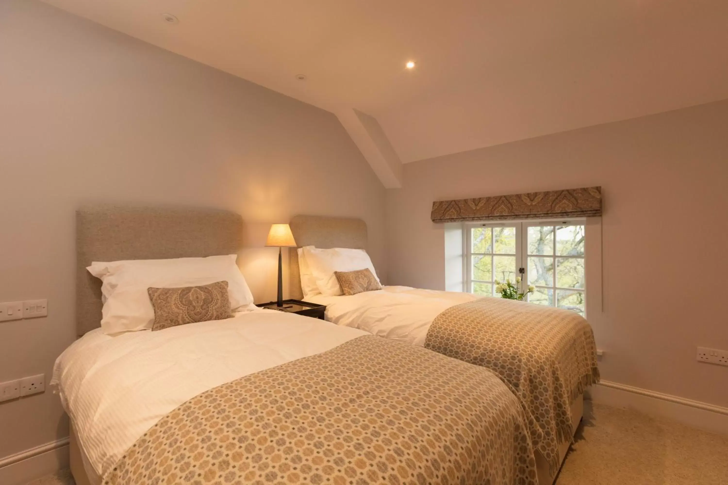 Bed in Farlam Hall Hotel & Restaurant