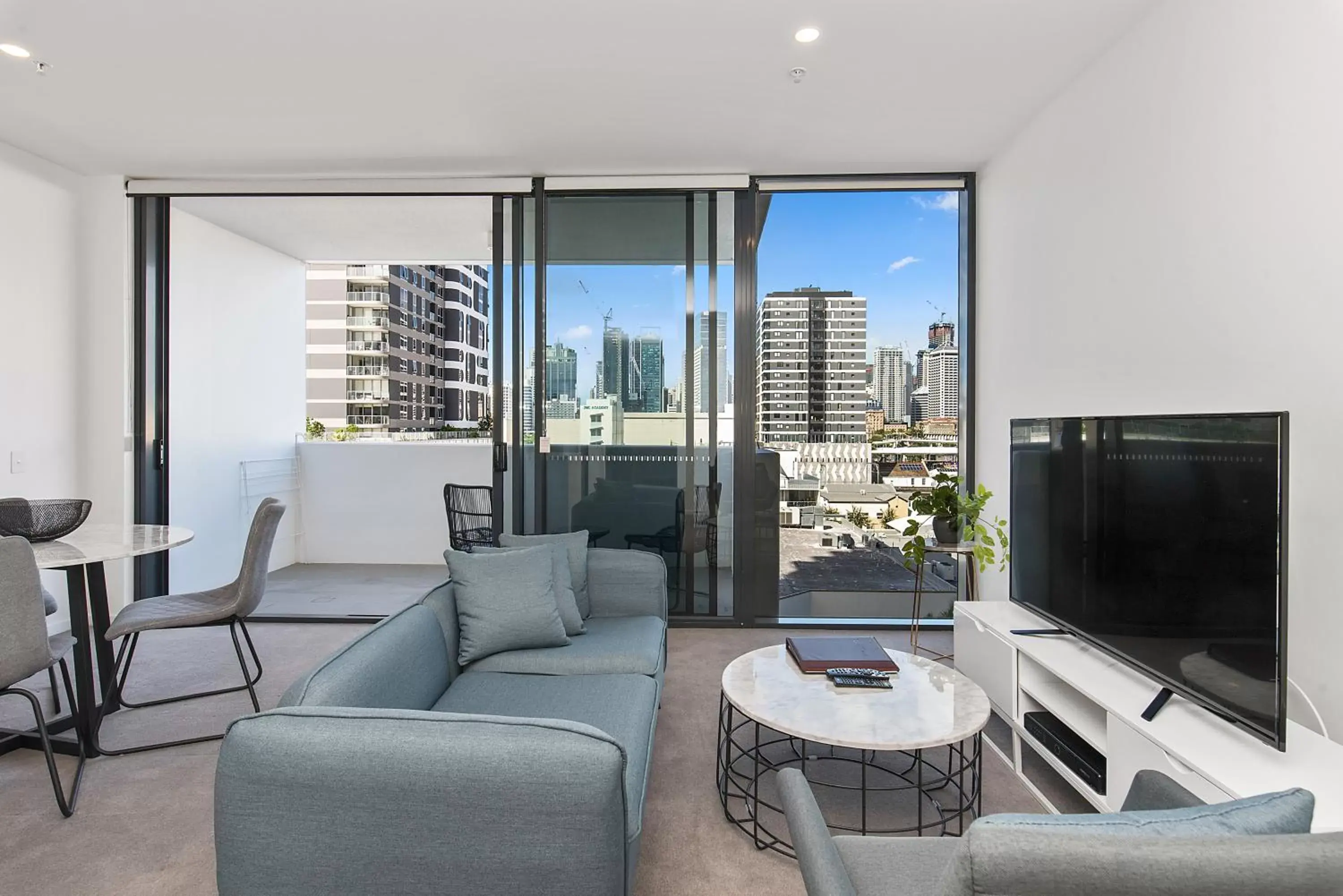 Living room, Seating Area in Ivy and Eve Apartments by CLLIX